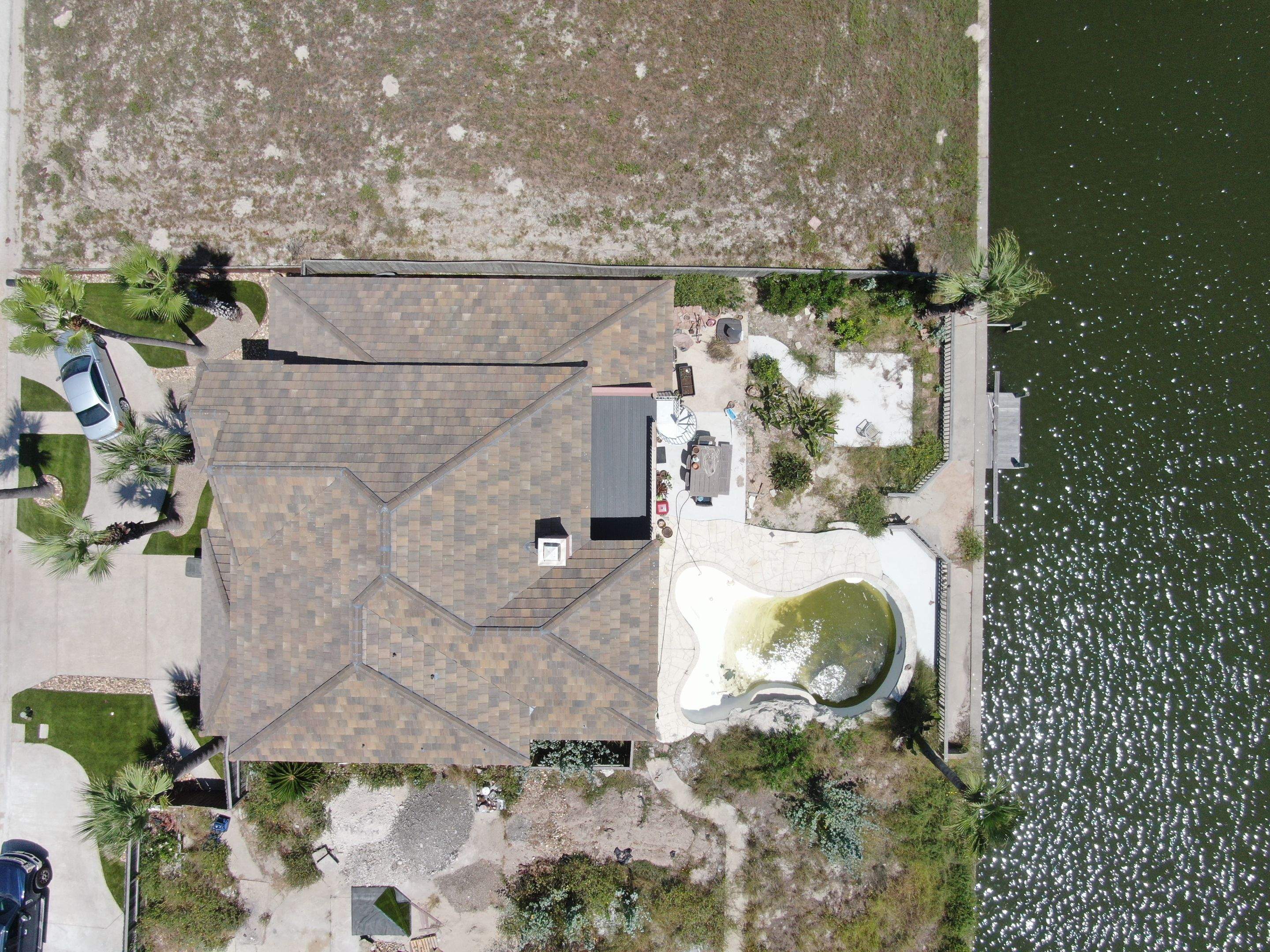 Busted to Beautiful! by Bayfront Roofing and Construction