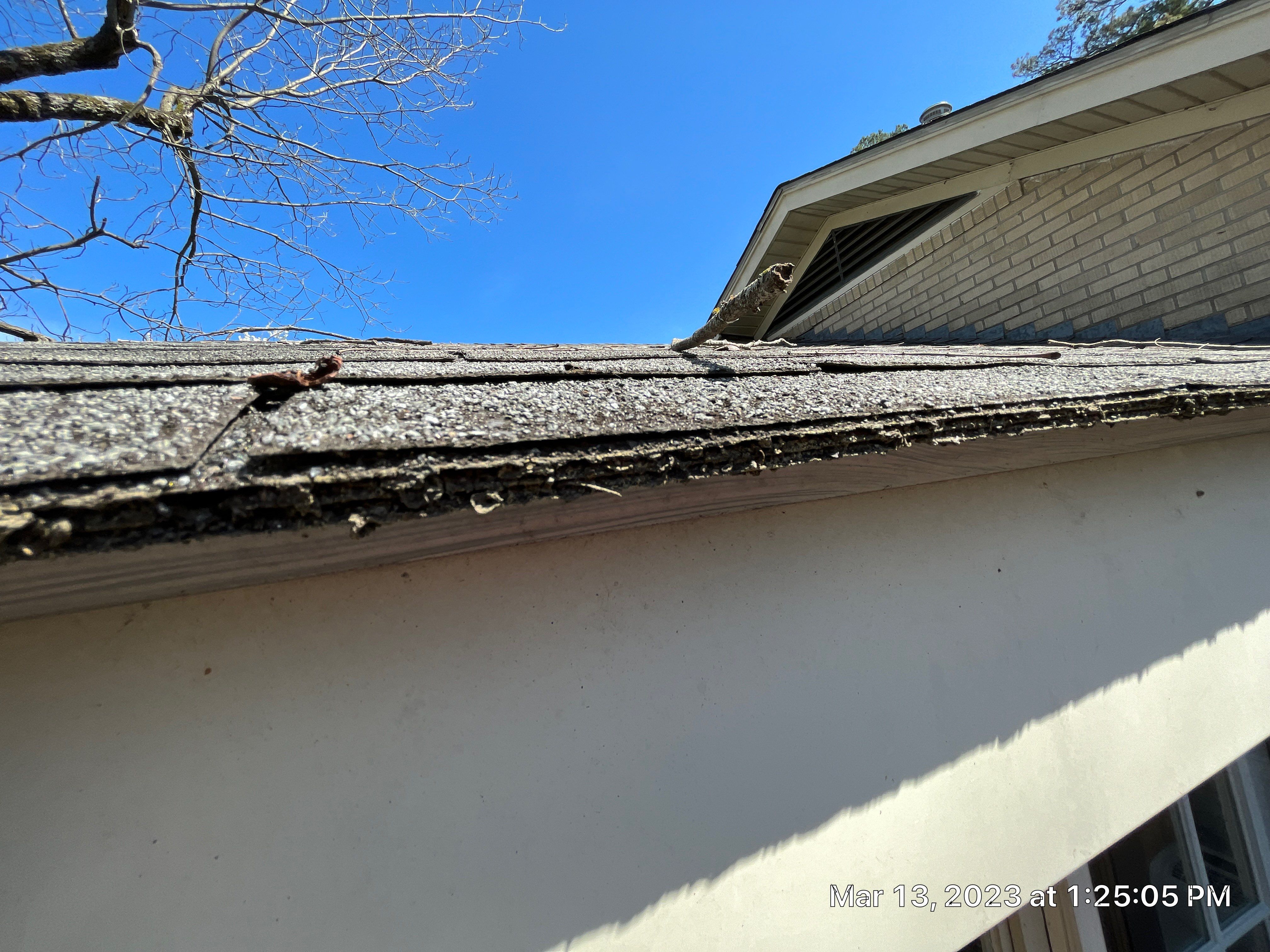 Residential Roofing Installation using 26 Gauge Colored Panels by Hostetler Roofing