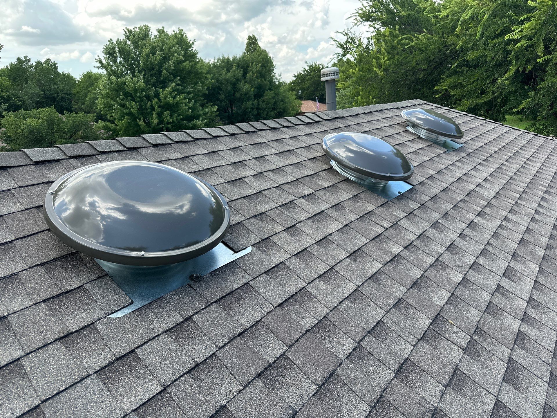 roof, chimney siding, & solar tube replacement in Edmond by McCann's Roofing and Construction