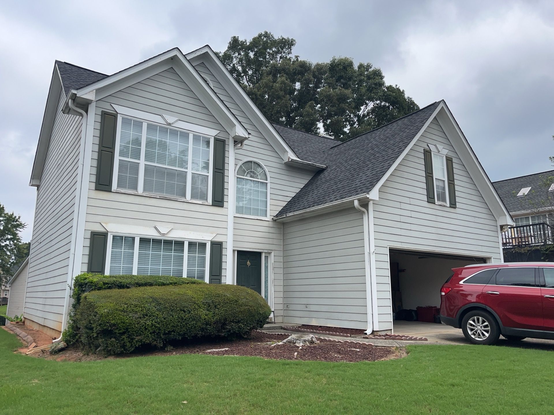 Lawrenceville, GA Full Siding Replacement, Exterior Painting, and Window Installation by Nelson Exteriors 