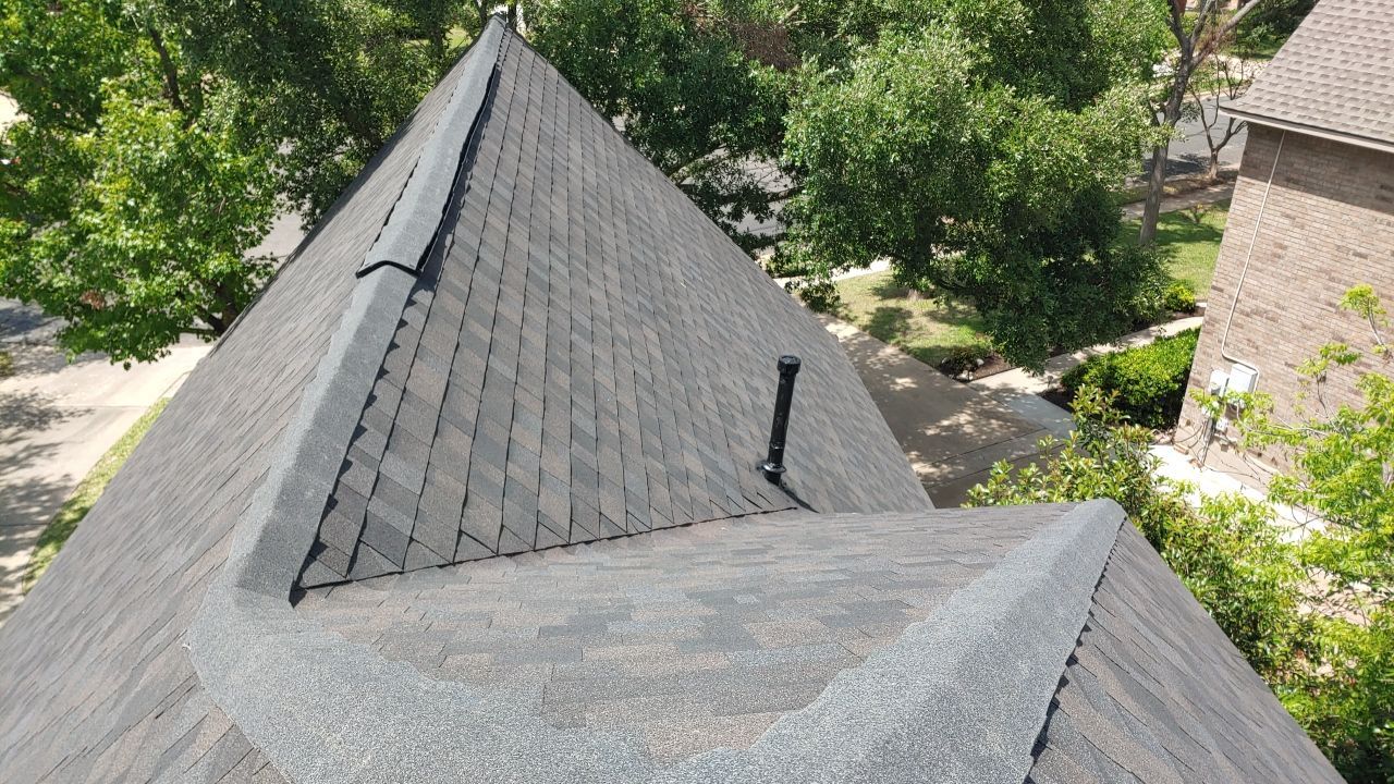Austin Residential Roof Replacement Featuring IKO Glacier Architectural Shingles by Caliber Restoration LLC