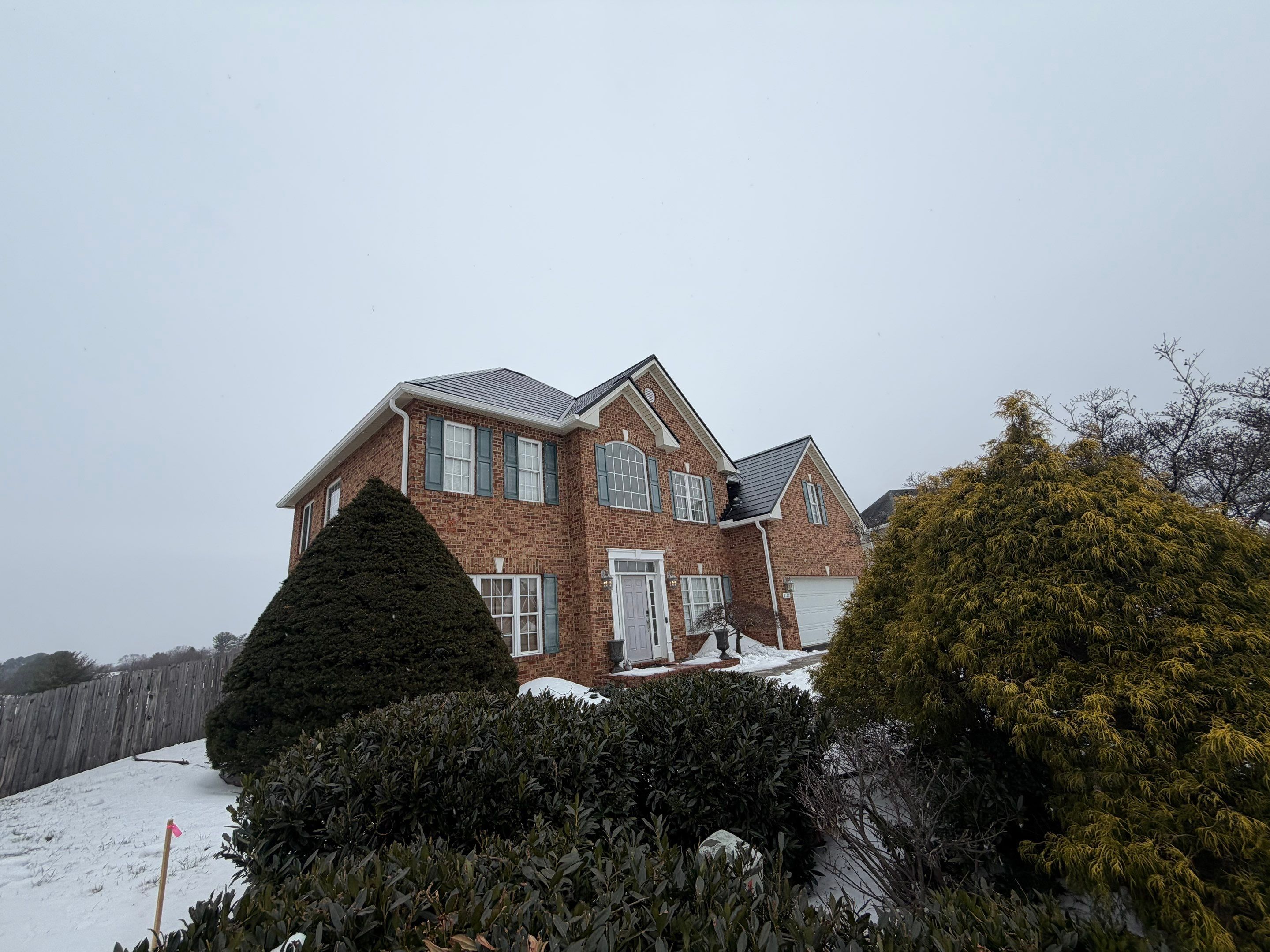 Winter Tesla Solar Roof Installation! by American Home Contractors