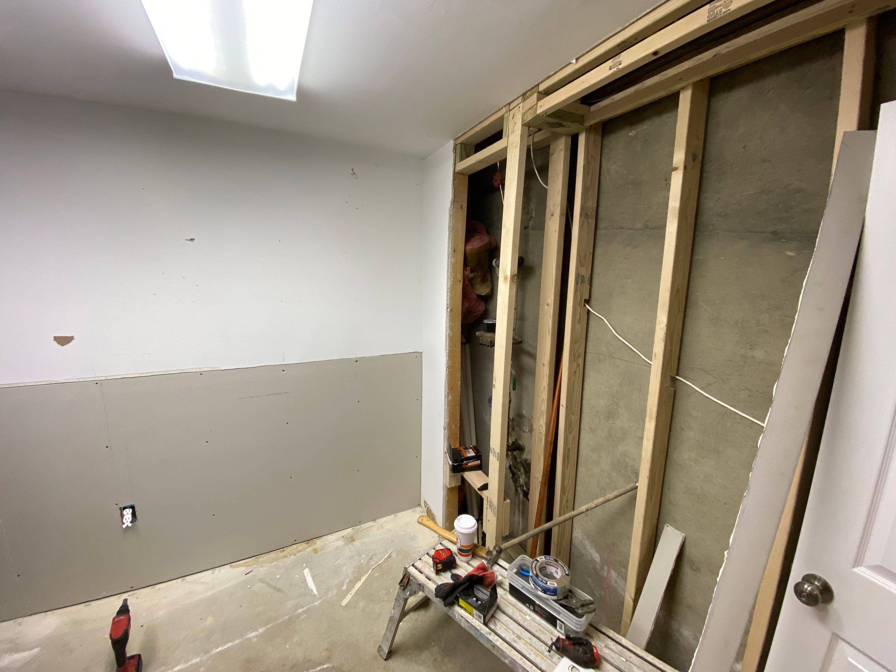 Laundry Room Redmodel using Lifeproof Luxury Vinyl Plank Flooring by The Smet Companies, LLC