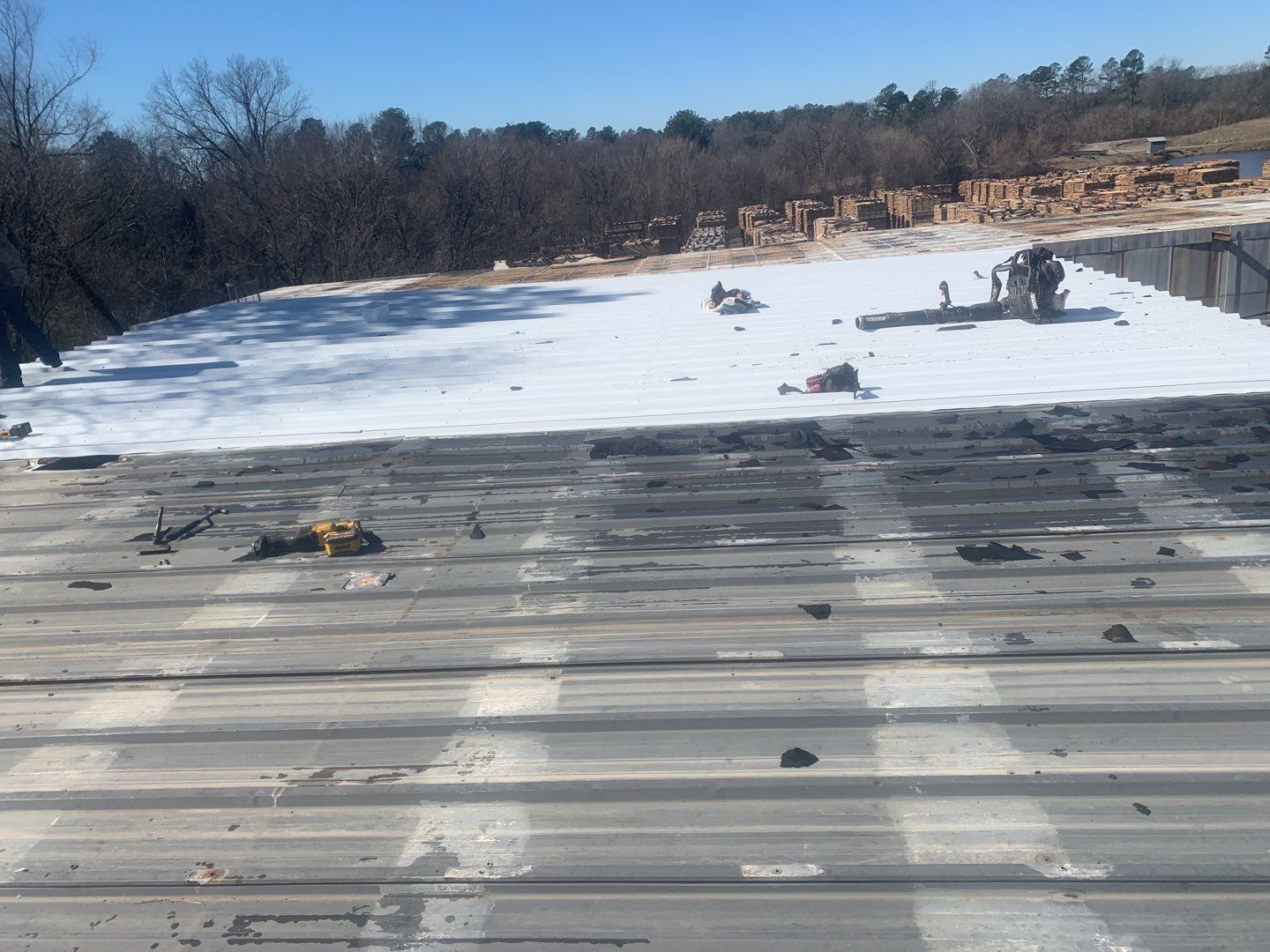 Commercial Roofing Installation using Aluminum Roofing panels by Hostetler Roofing