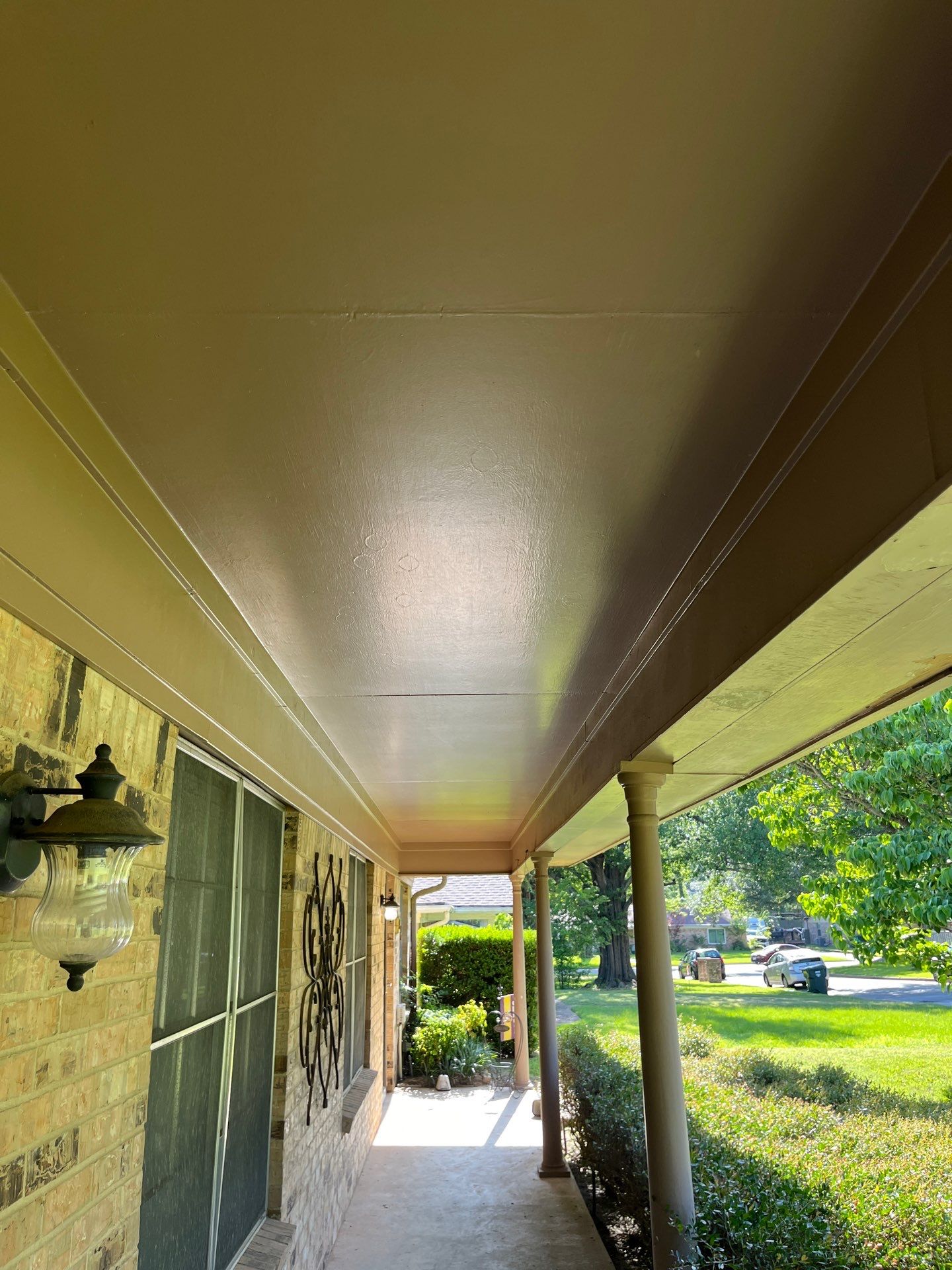 Exterior Painting in Tyler, TX | Eaves, Door & Columns in Elegant Black by Quality Coats Painting