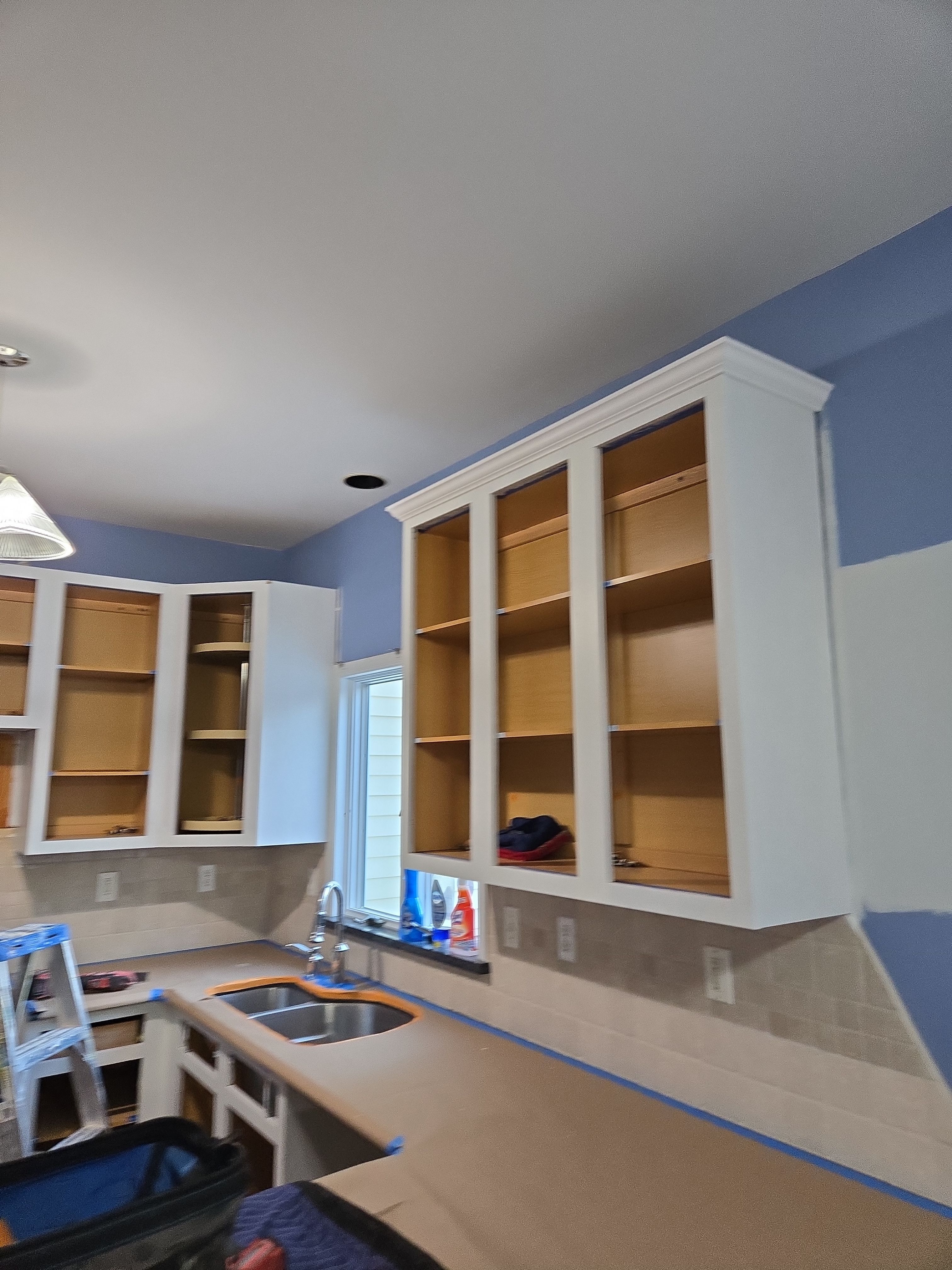 Cabinet Refinishing using Benjamin Moore Command by Spectrum Painting, LLC