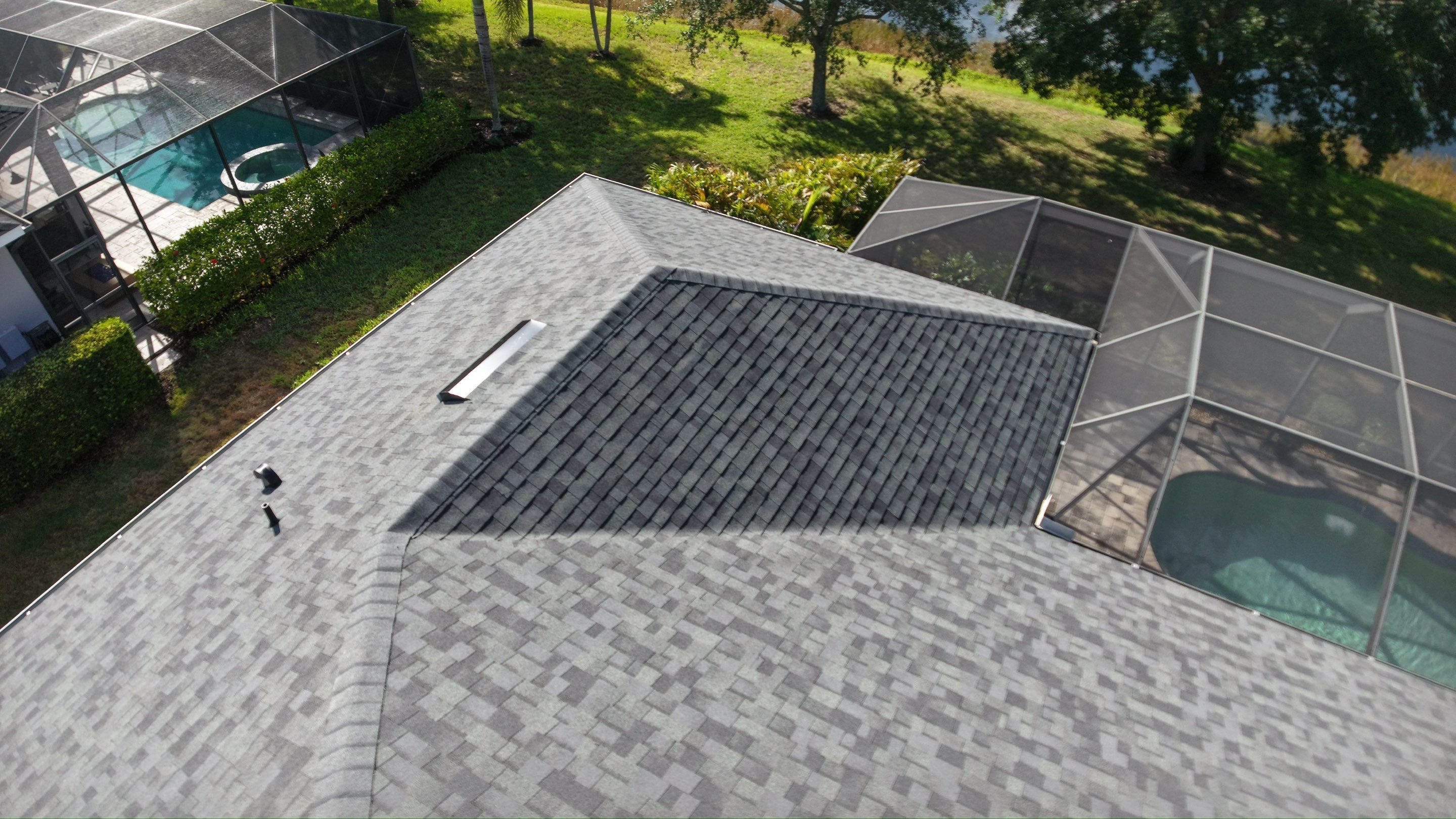 Residential Roof Installation With Estate Grey Architectural Shingles in Bradenton by Trinity Restoration and Roofing LLC