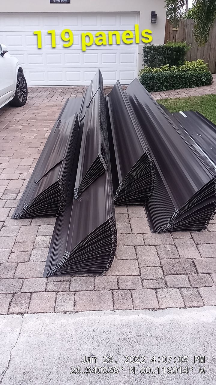 Residential Roofing Installation using 1" Nail strip metal roof by BLUES BROTHERS CONSTRUCTION CORP