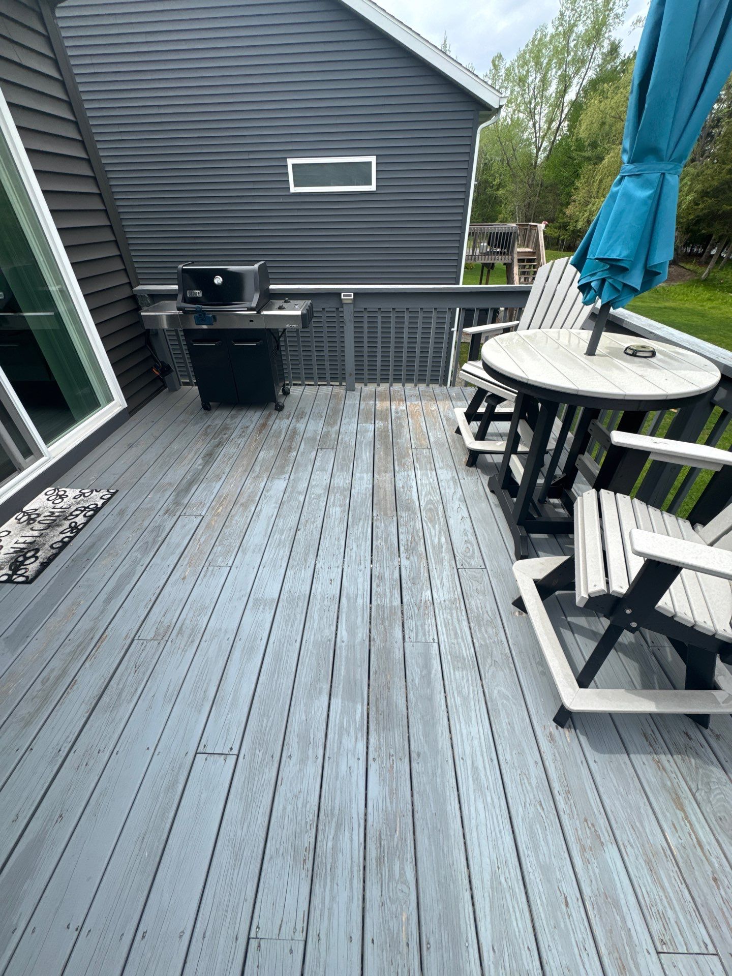 Solid Color Deck Staining for a Residential Home in Spring Lake by Gordon Painting