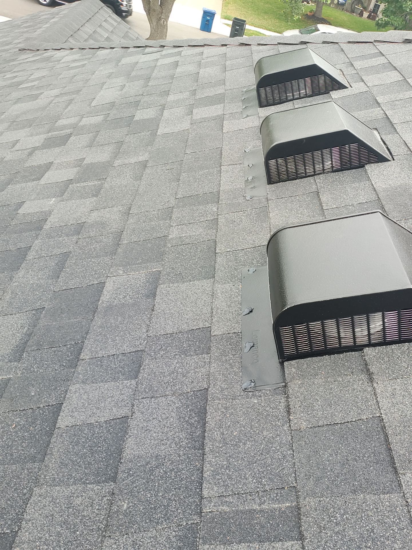 Nothing looks nicer than a little black roof by Bayfront Roofing and Construction