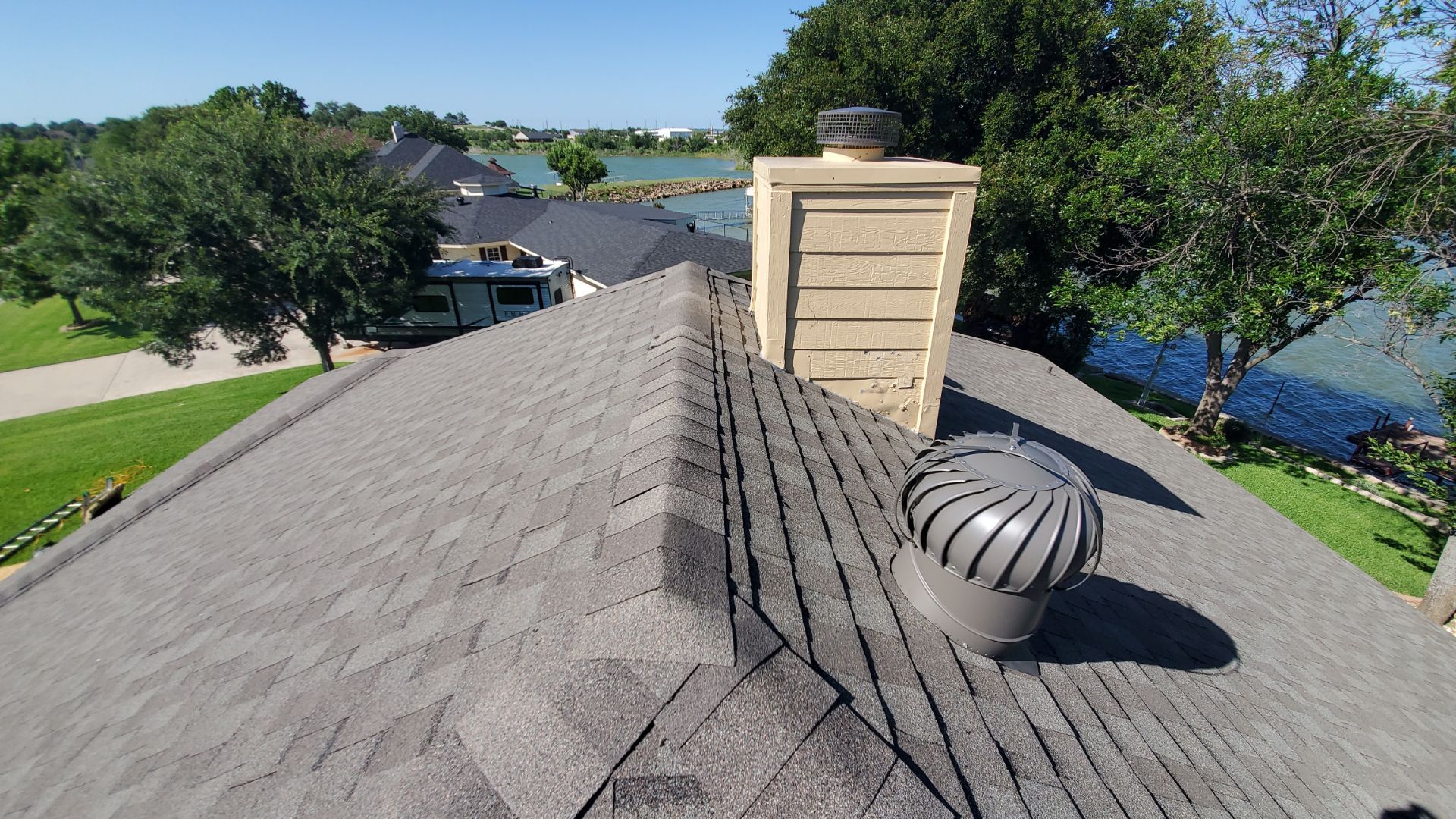 Full Architectural Shingle Roof Replacement and Chimney Repair in Runaway Bay by Armor Roofing | Exteriors