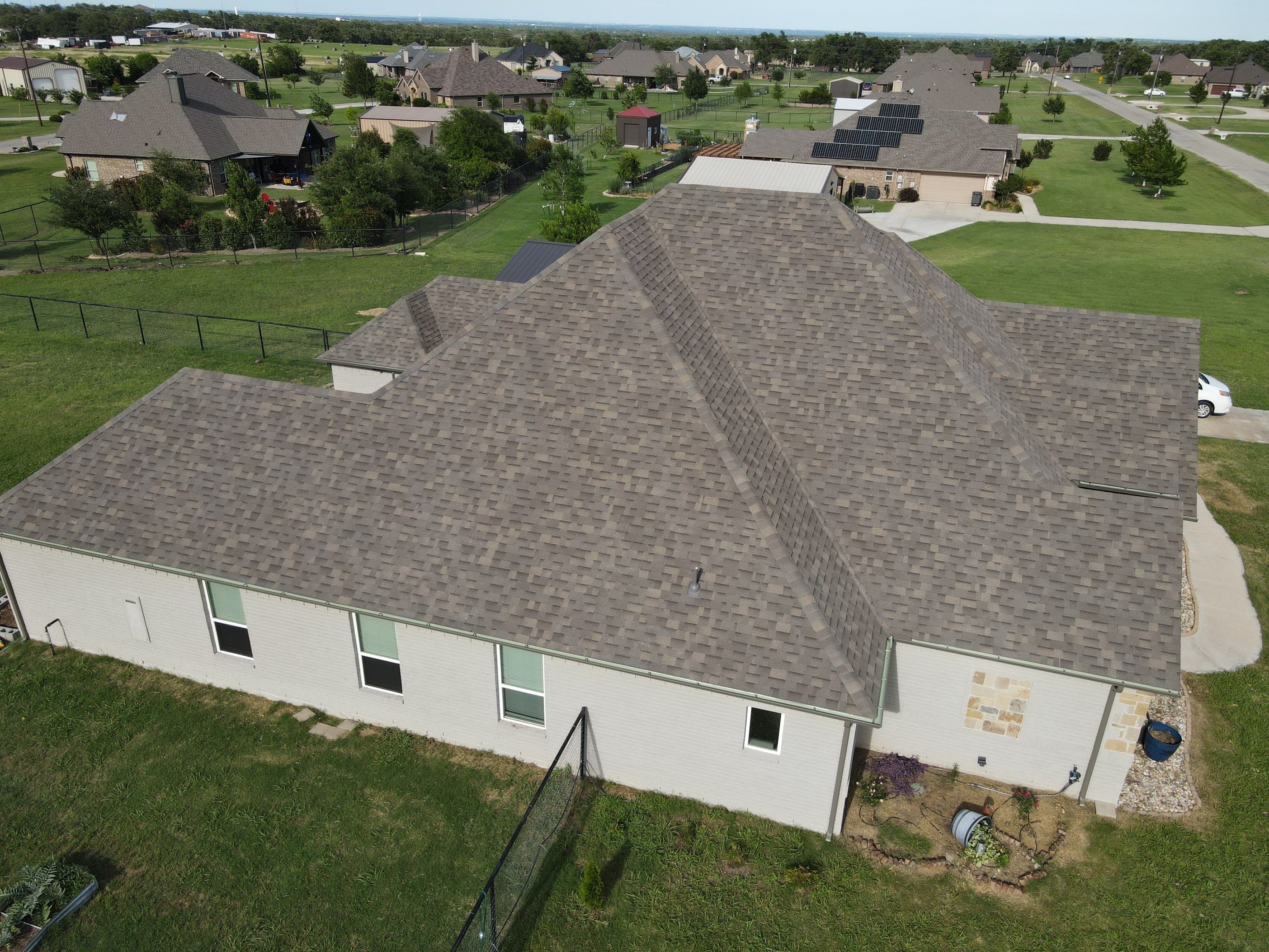 Architectural Shingle Roof Installation and Gutter Updates in Springtown by Berry Good Roofing