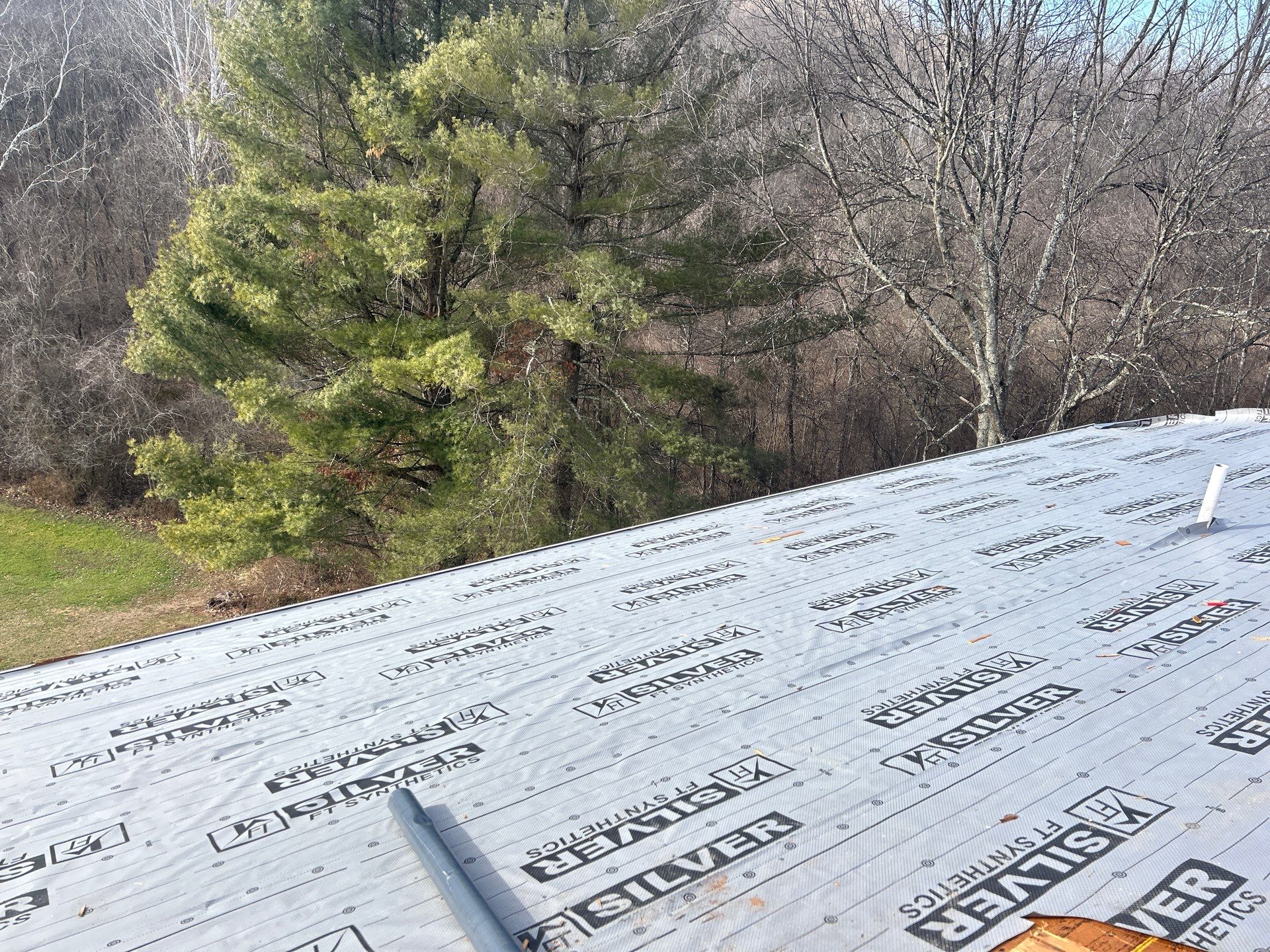 Residential Roofing Installation using Metal by Rainstoppers Roofing
