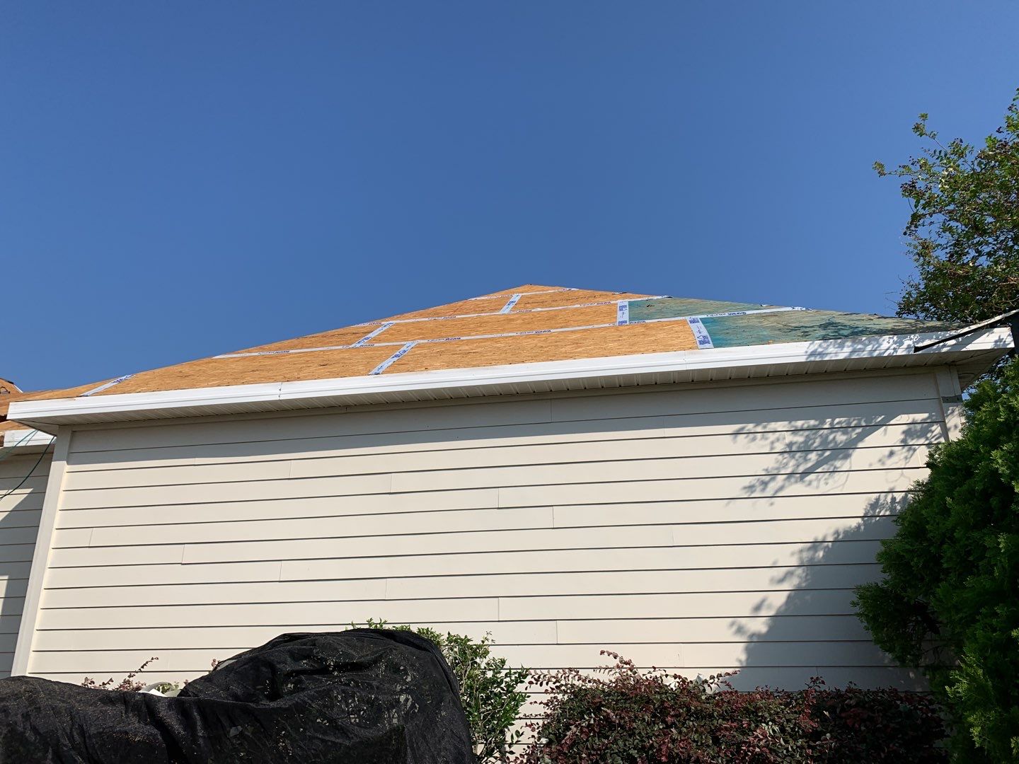 Residential Roofing Installation using Roof Replacement by American Roofing & Construction LLC