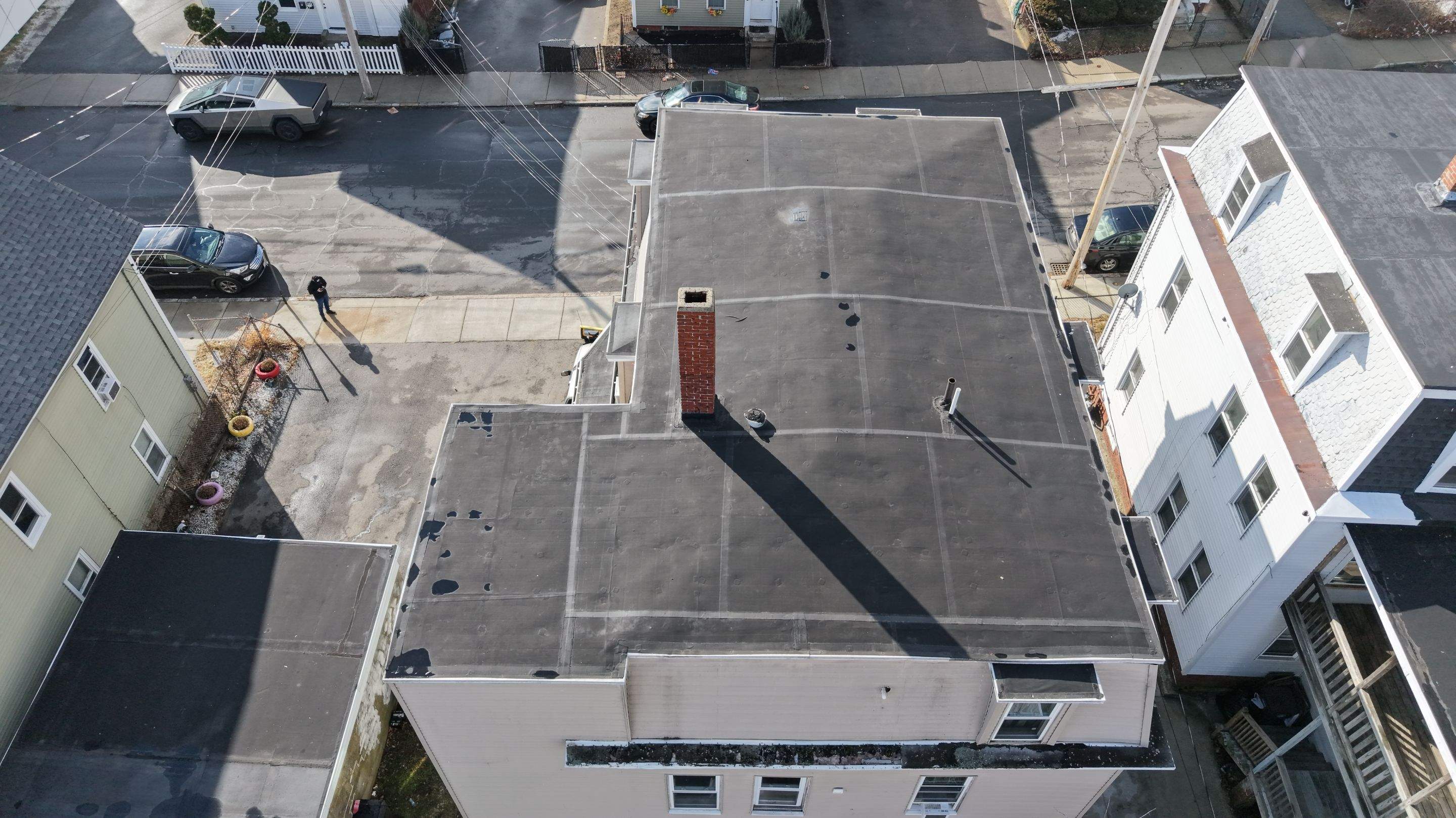 Gravel Roof Tear-Off & EPDM Rubber Roof Conversion in Haverhill, MA by JOHNNYS PRO