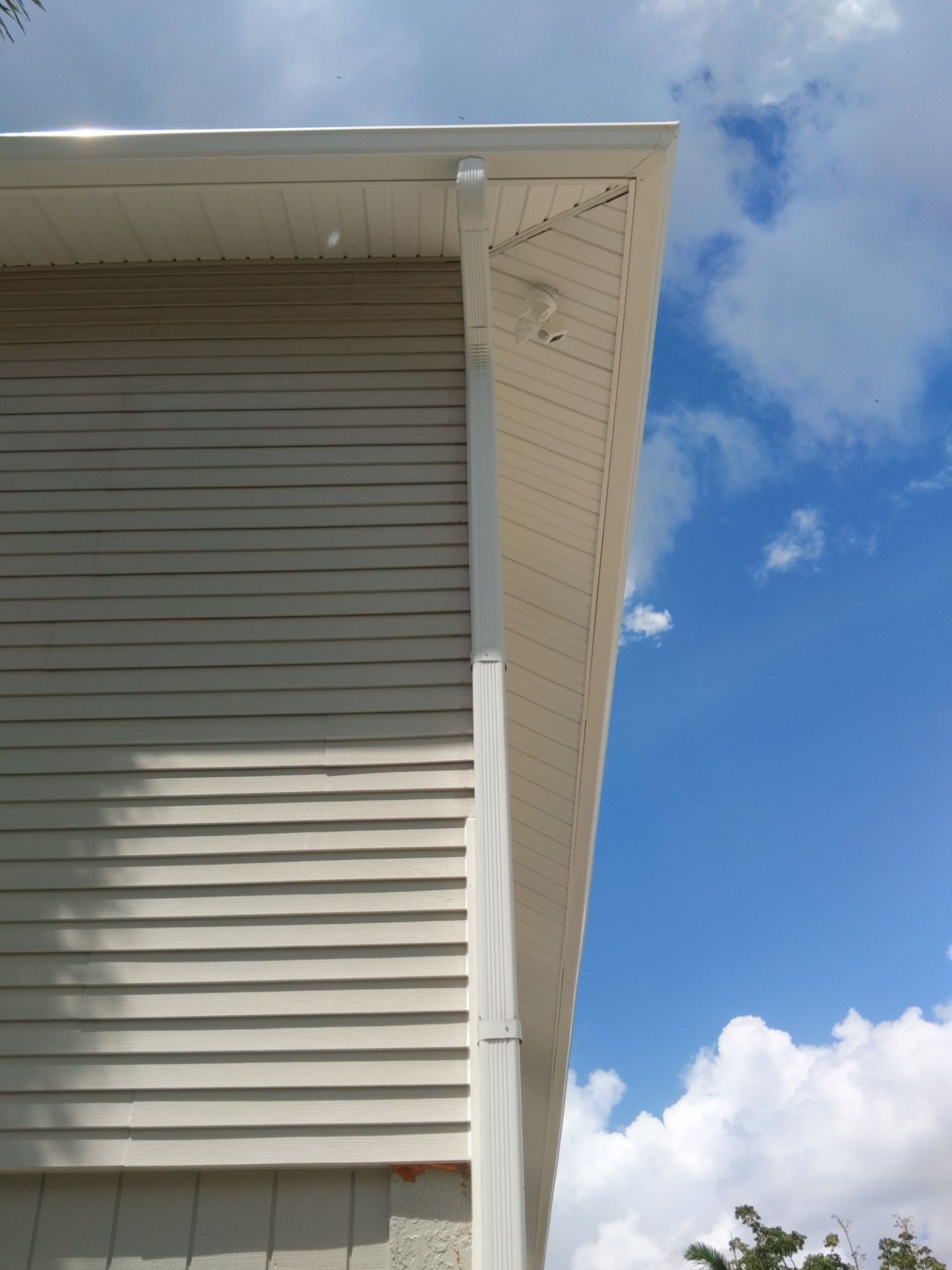 Complete Gutter System with Downspouts & Guards in Fort Myers Beach FL by Gutter Professors