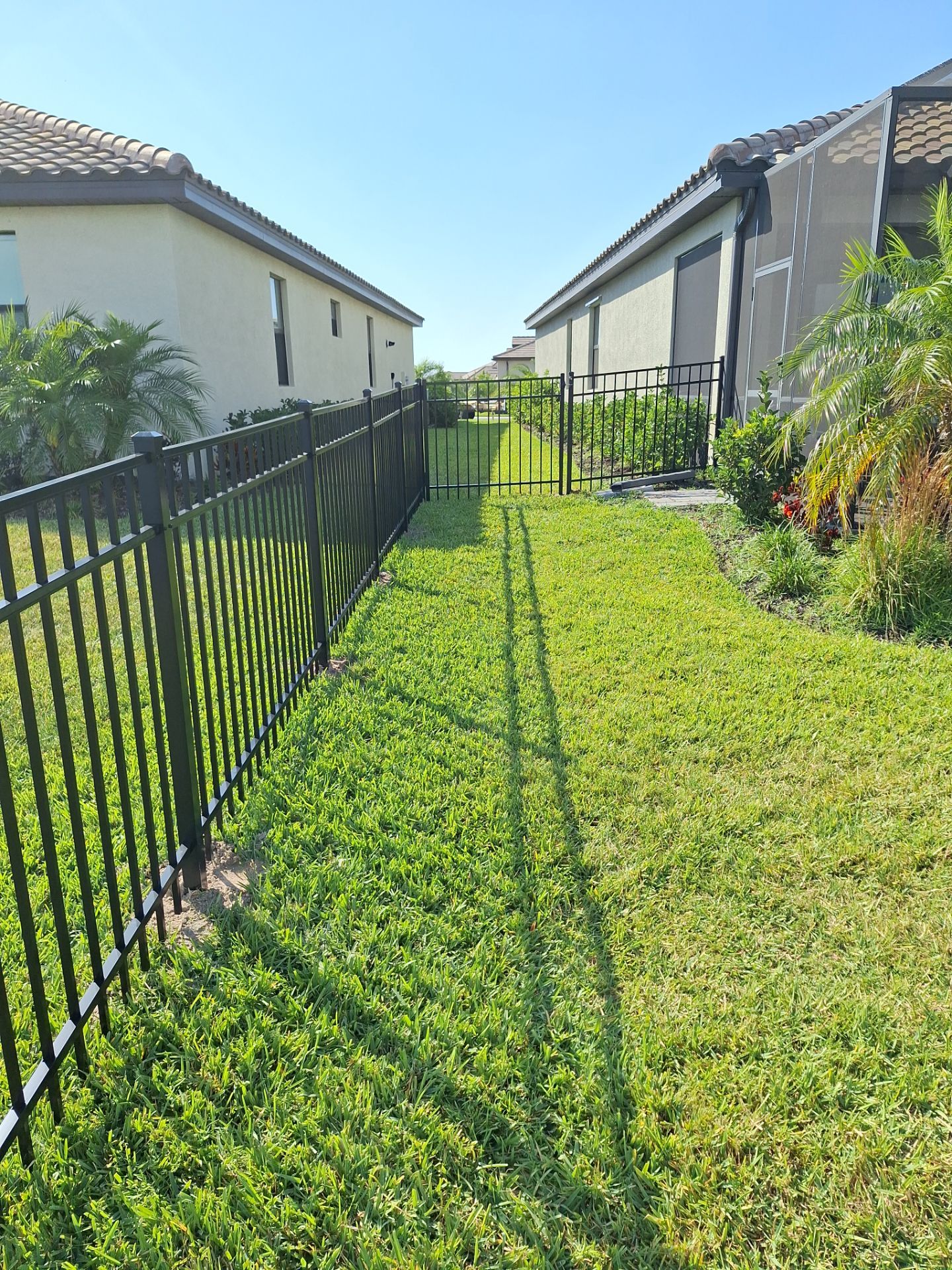 Aluminum Fence Installation using Black 3 Rail Aluminum Fence by Asap fence and gates, LLC