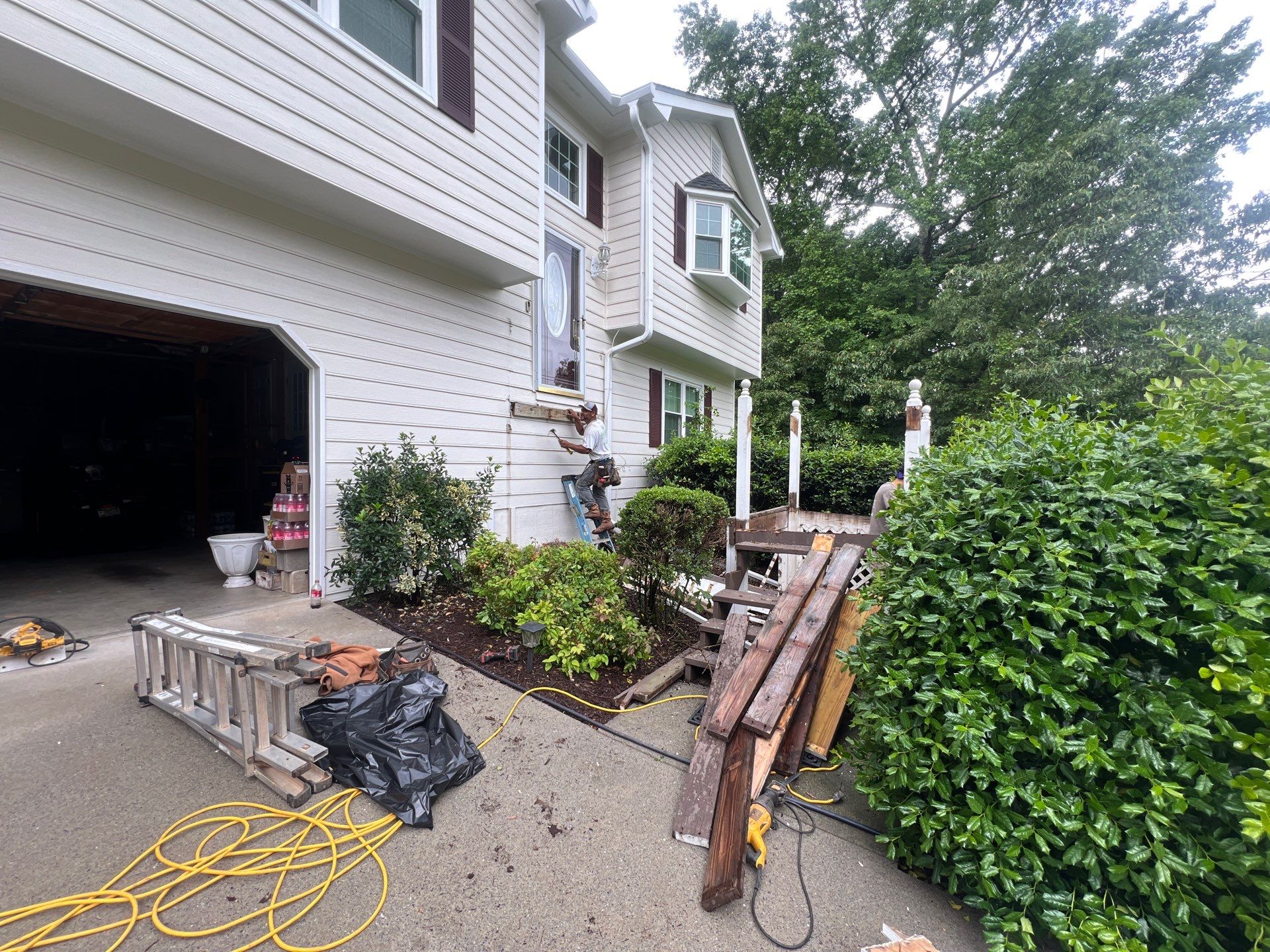 Front Entrance Deck Stair Replacement with White Vinyl Railings in Lawrenceville by Swift Home Renovations