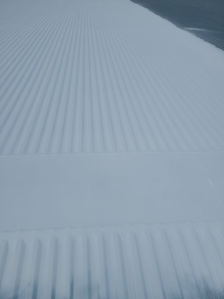 Commercial Metal Restoration System using Aldocoat Coatings by Hostetler Roofing