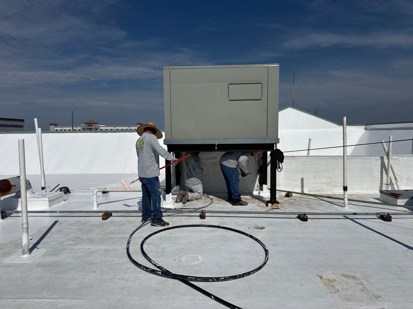 Commercial White Silicone Roof Coating for Hotel in Oldsmar by CES Roofing