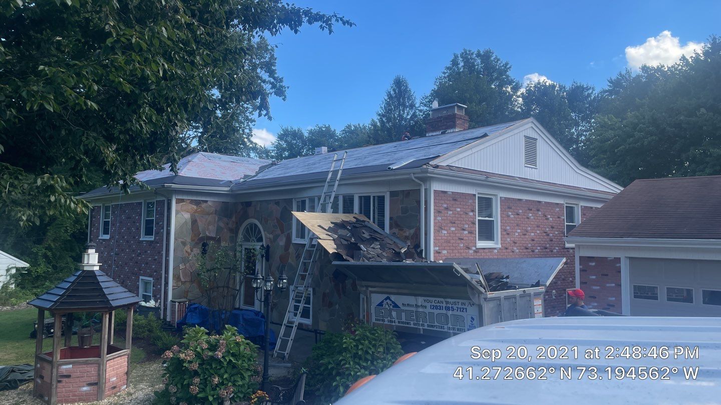 Residential Roofing Installation using Owens Corning Duration Slatestone Gray by A Plus Exterior