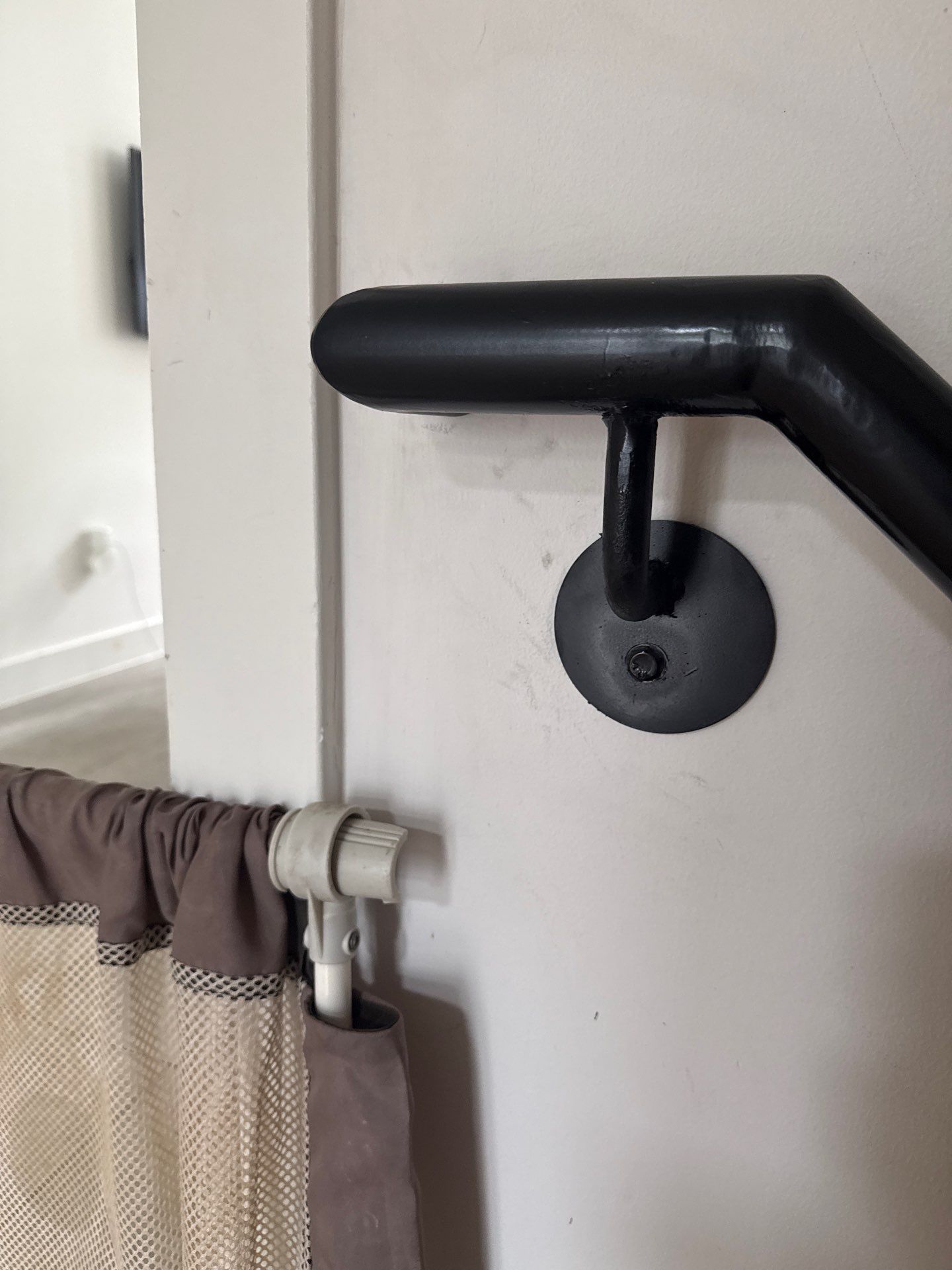 Two Black Metal Handrail Installation Across Multi-Level Washington Staircases by Capitol Iron Works