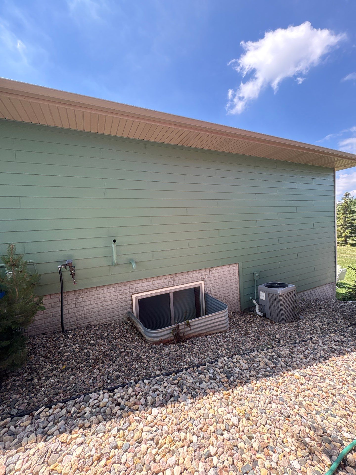 Full Exterior Residential Painting and Siding Refresh in Tea by Select Painting, Coatings & Garage Cabinets