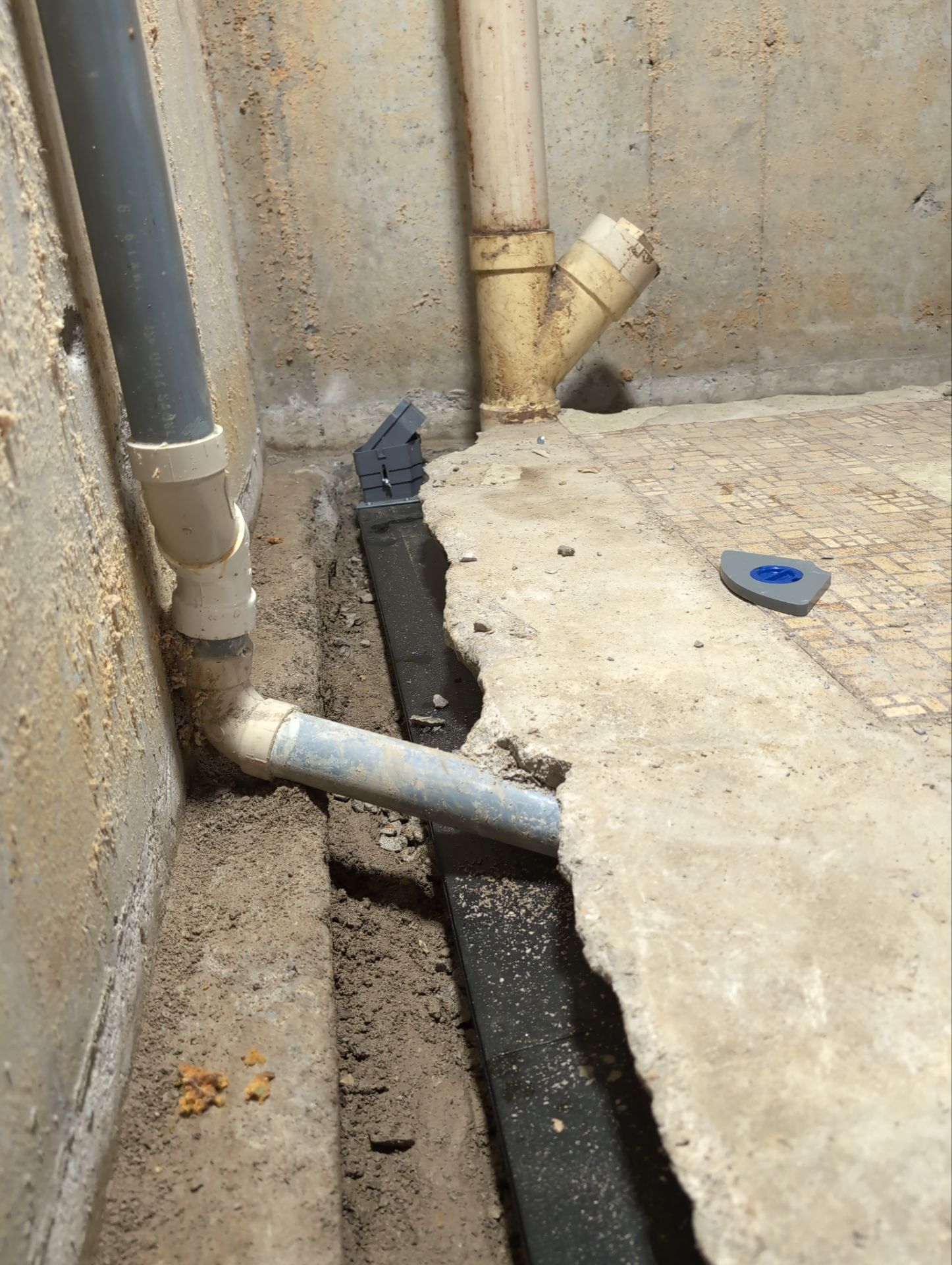 Interior Basement Waterproofing System and Egress Window Installation by Toledo Basement Repair 