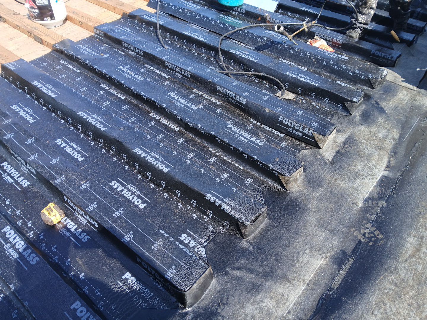 Residential Roofing Installation using Polyglass Torch Down Roofing System by Hull Brothers Roofing