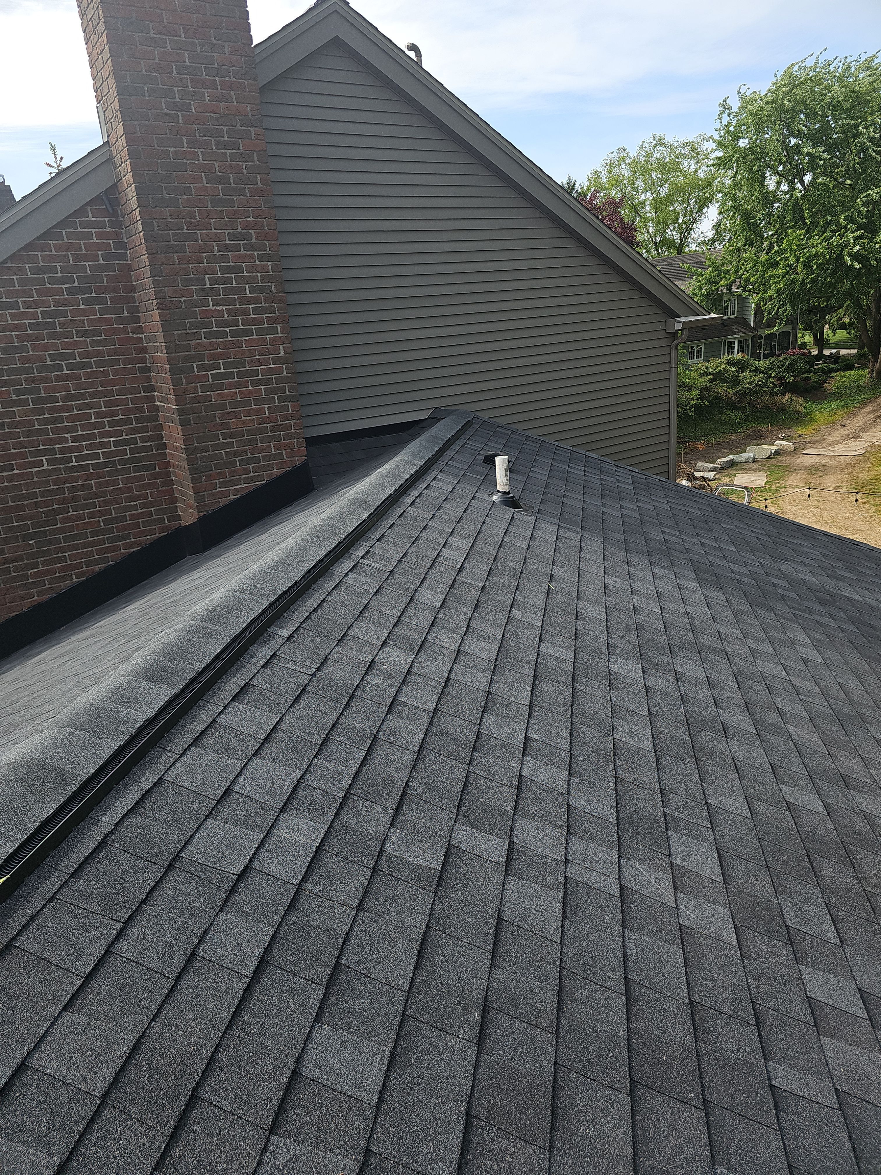 2251 Mission Hills Drive Southeast Grand Rapids, MI 49546 by Veteran Roofing & Exteriors