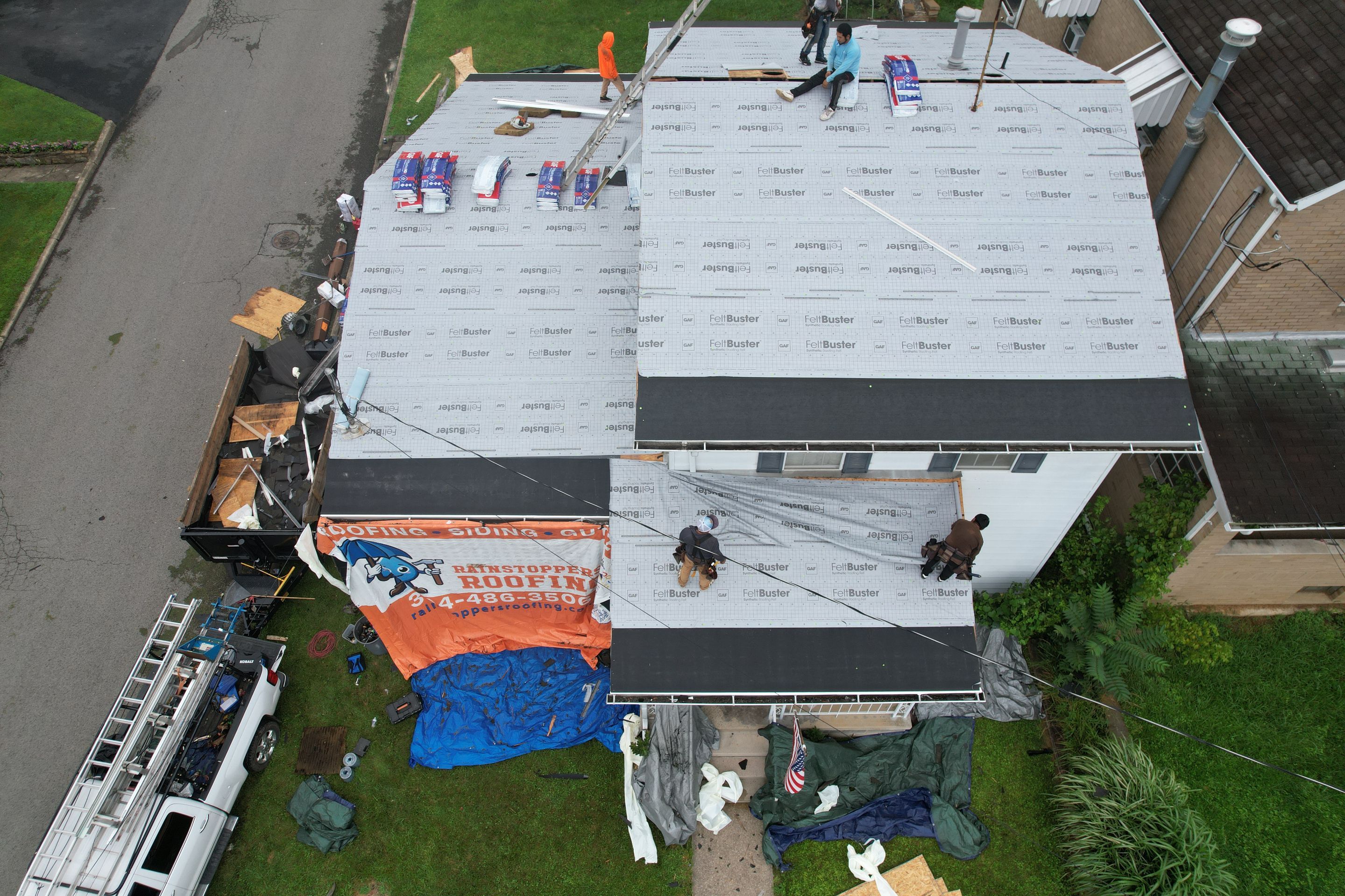 Residential Roofing Installation using GAF Timberline HDZ Oyster Grey by Rainstoppers Roofing