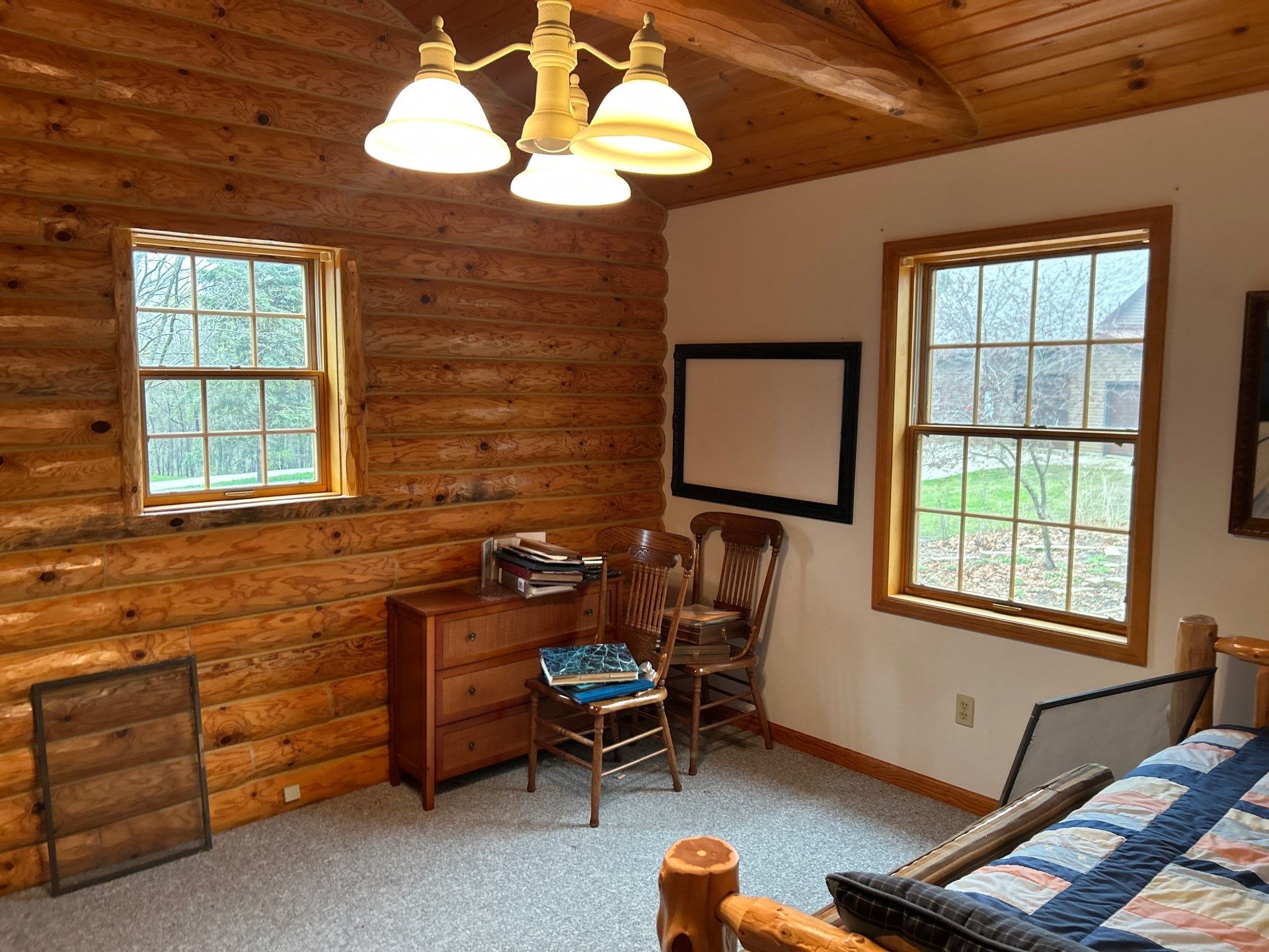 Pella Window installation using Pella Lifestyle wood/Aluminum window by United Windows and Siding LLC