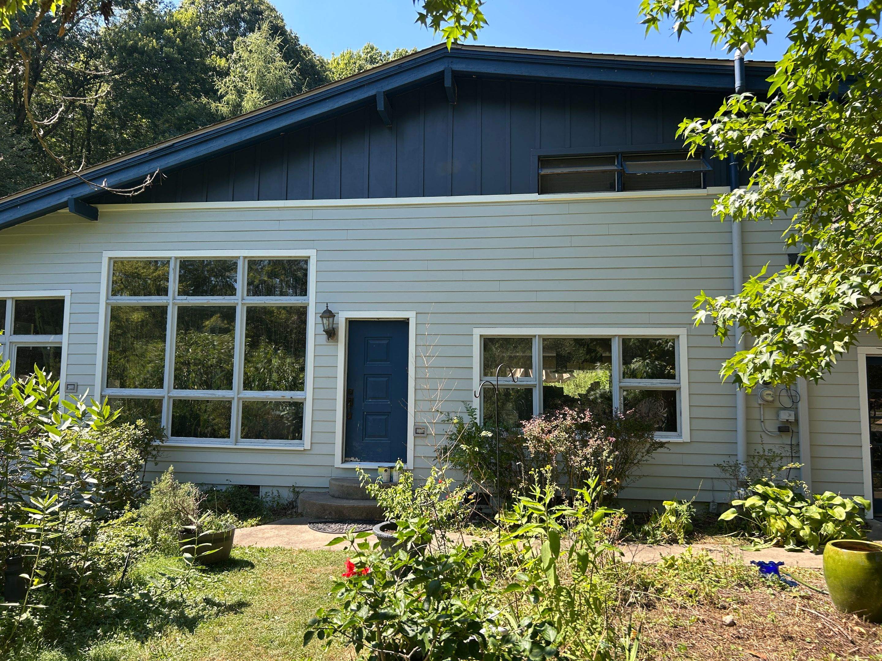 Two-Tone Siding and Sunroom Exterior Remodel in Beaver Falls by Ideal Siding Pittsburgh