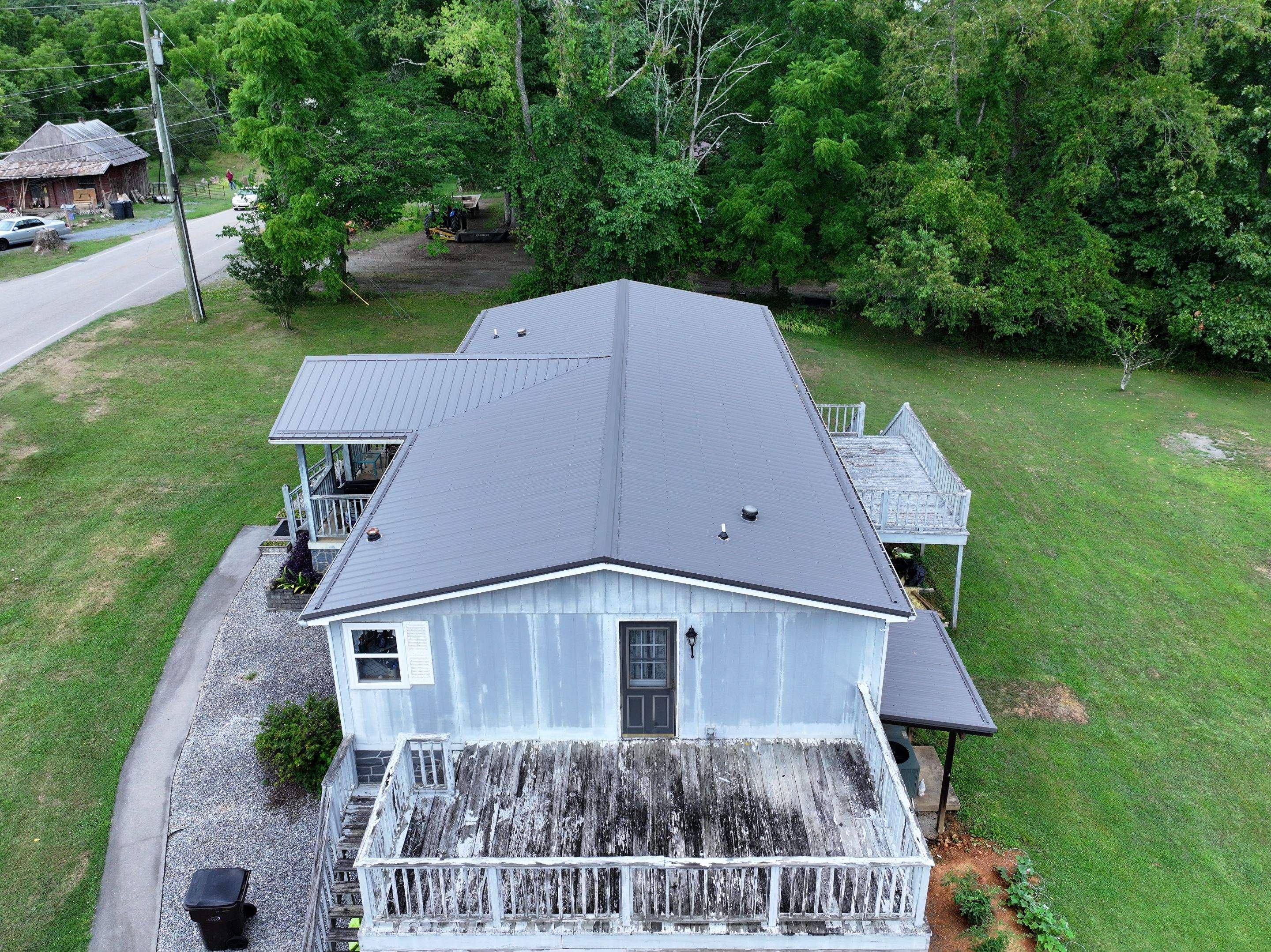 Hollingshead Residence by Omnia Roofing