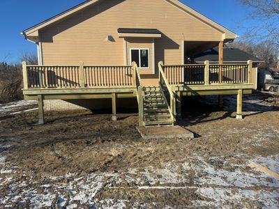 Treated wrap around deck