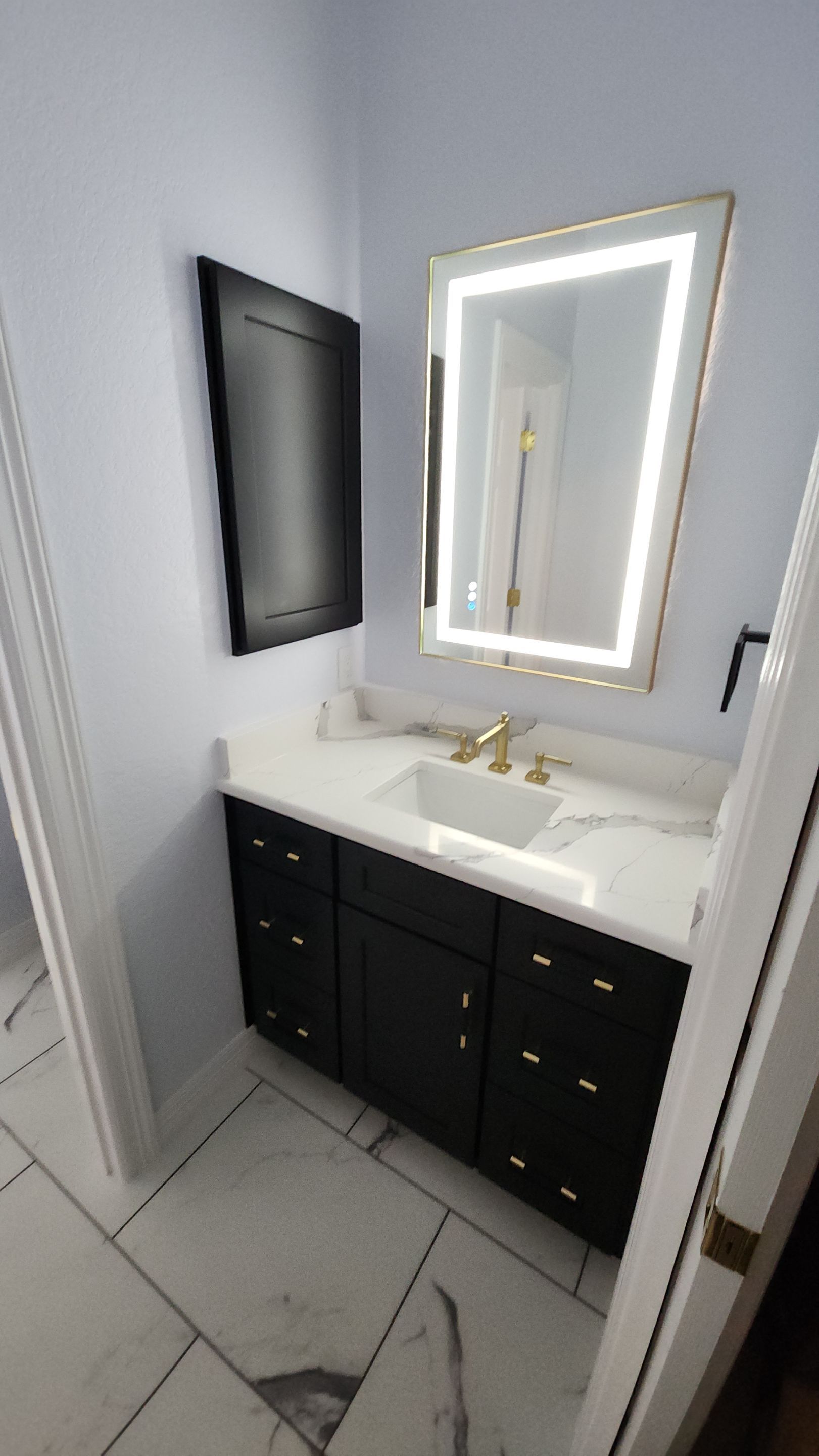Monochromatic Bathroom Remodel featuring Walk-In Shower by Legacy Bath and Kitchen 