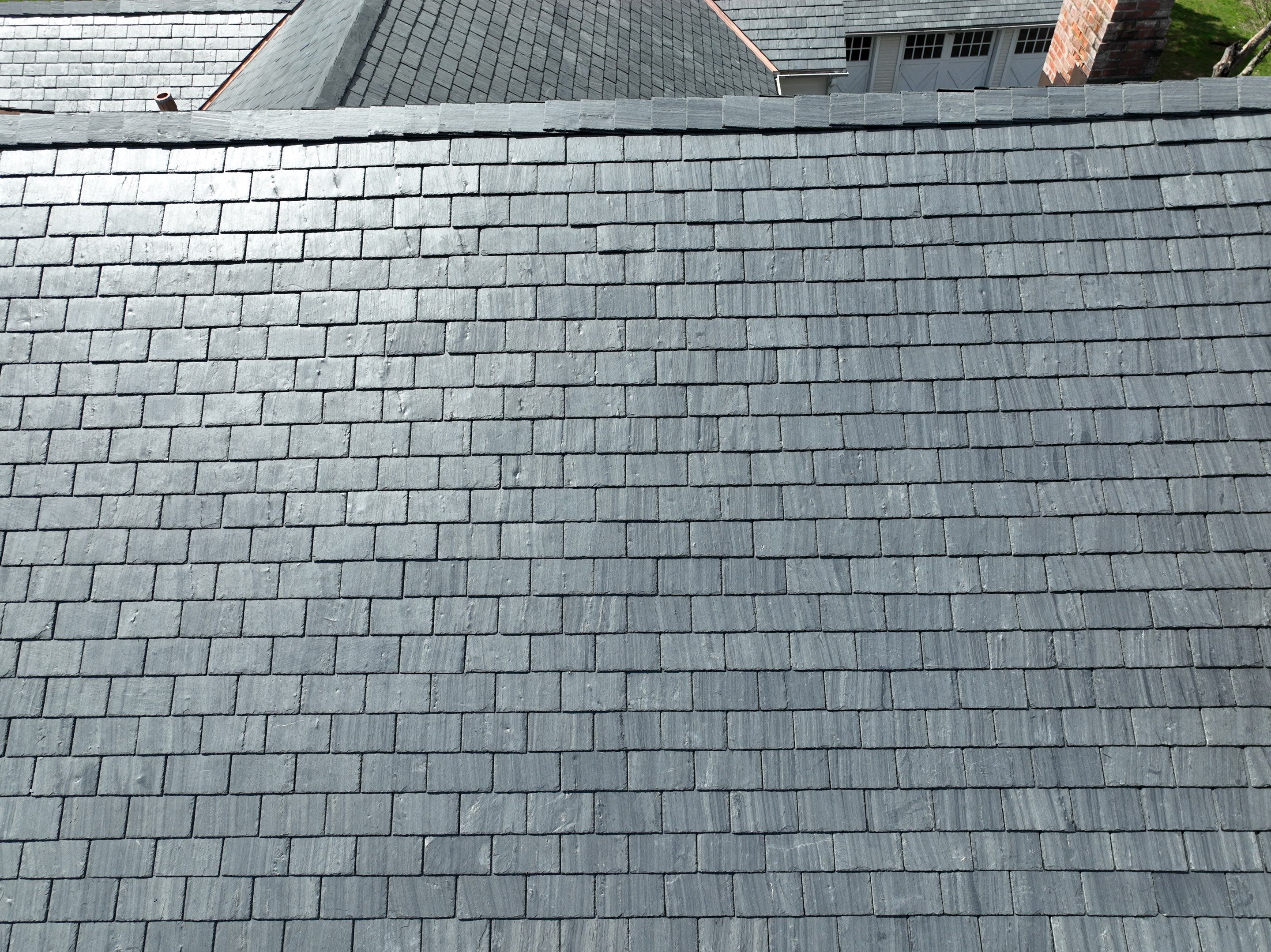 Residential Roofing Installation using Vermont Slate by A Plus Exterior
