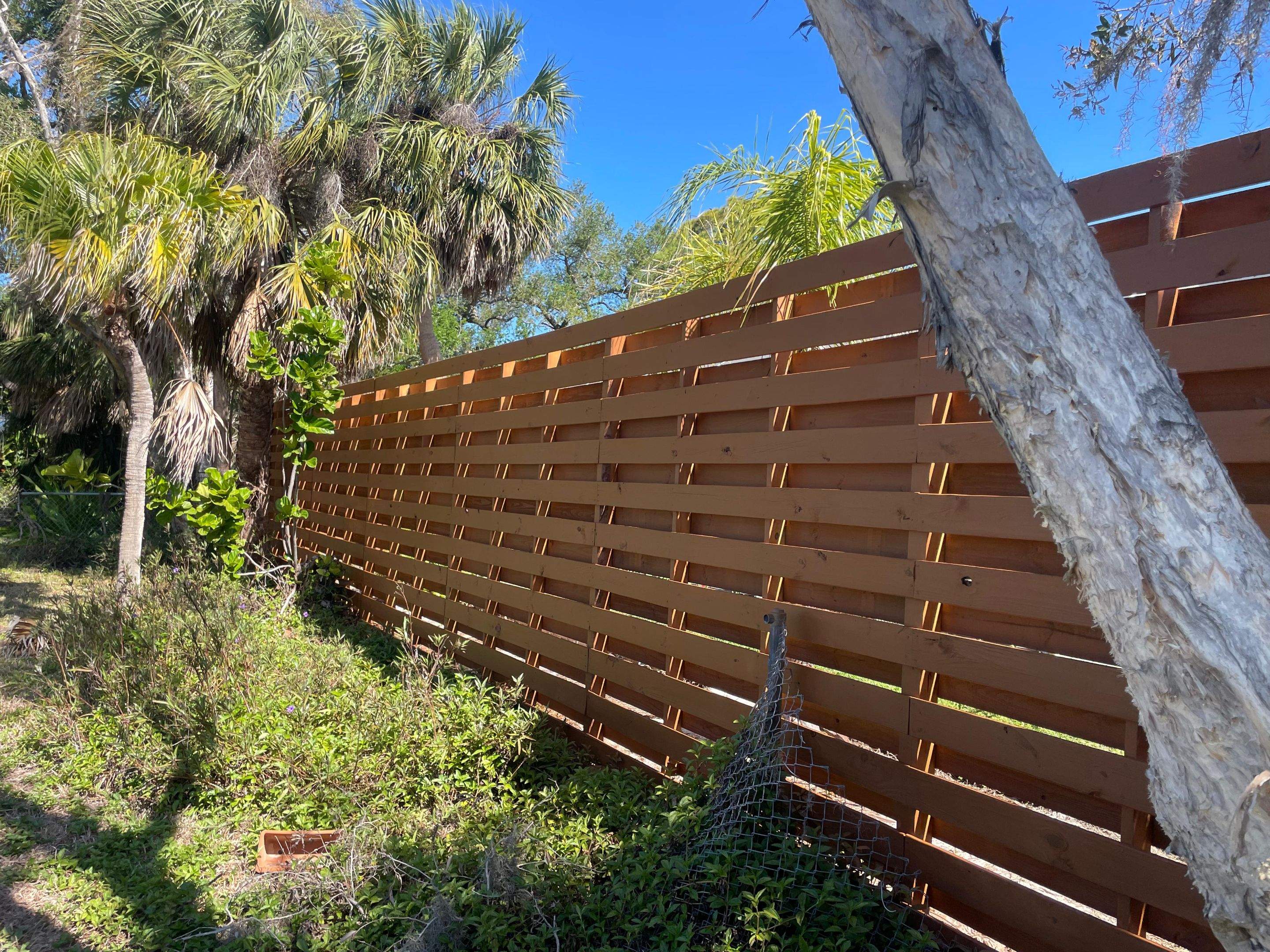 8'H Stained Shadowbox Wood in Nokomis by True Fence LLC