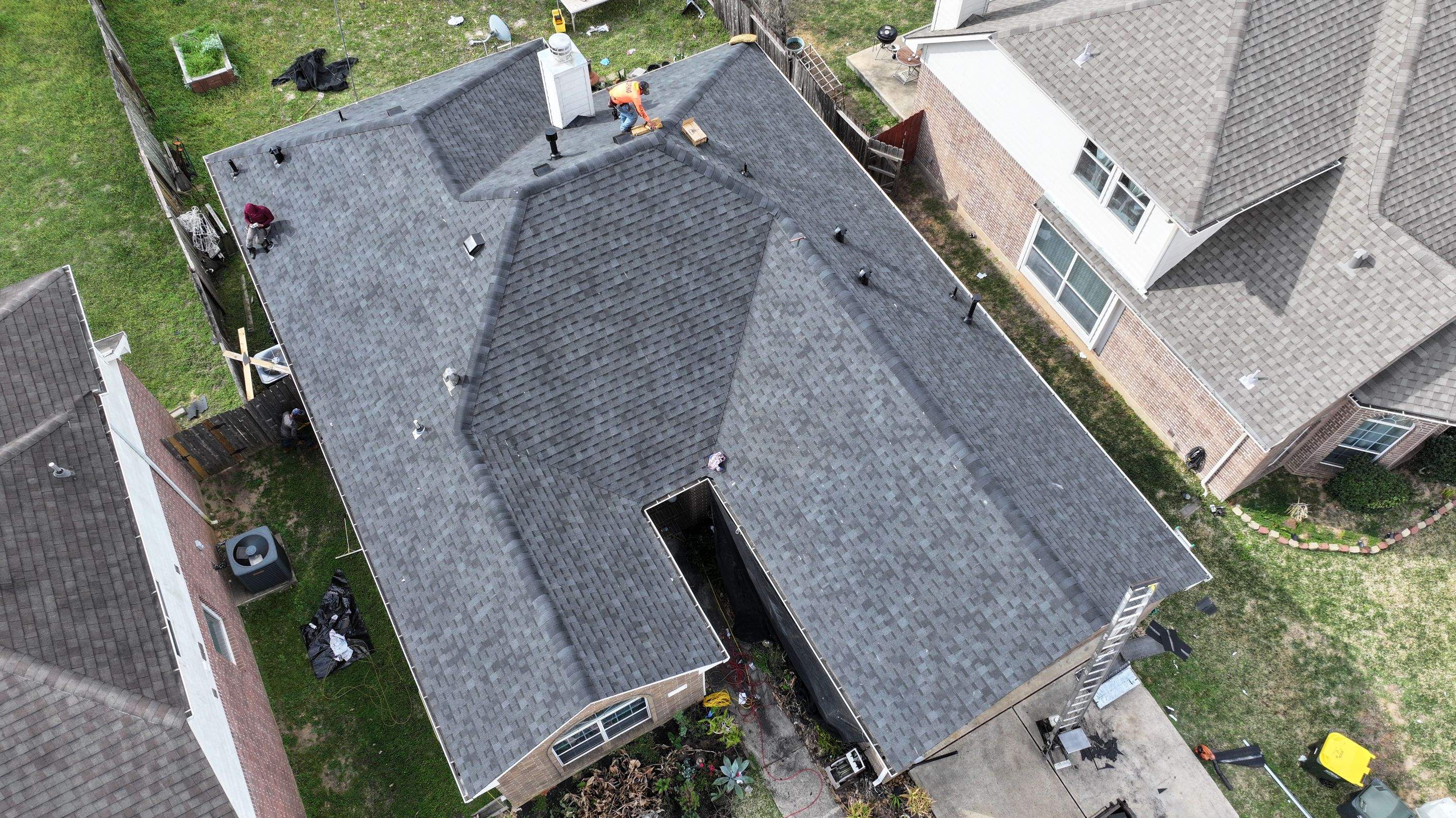 Full Roof Replacement on Brick Two-Story — Conroe, TX by PL Roofing & SB Roofing, LLC.