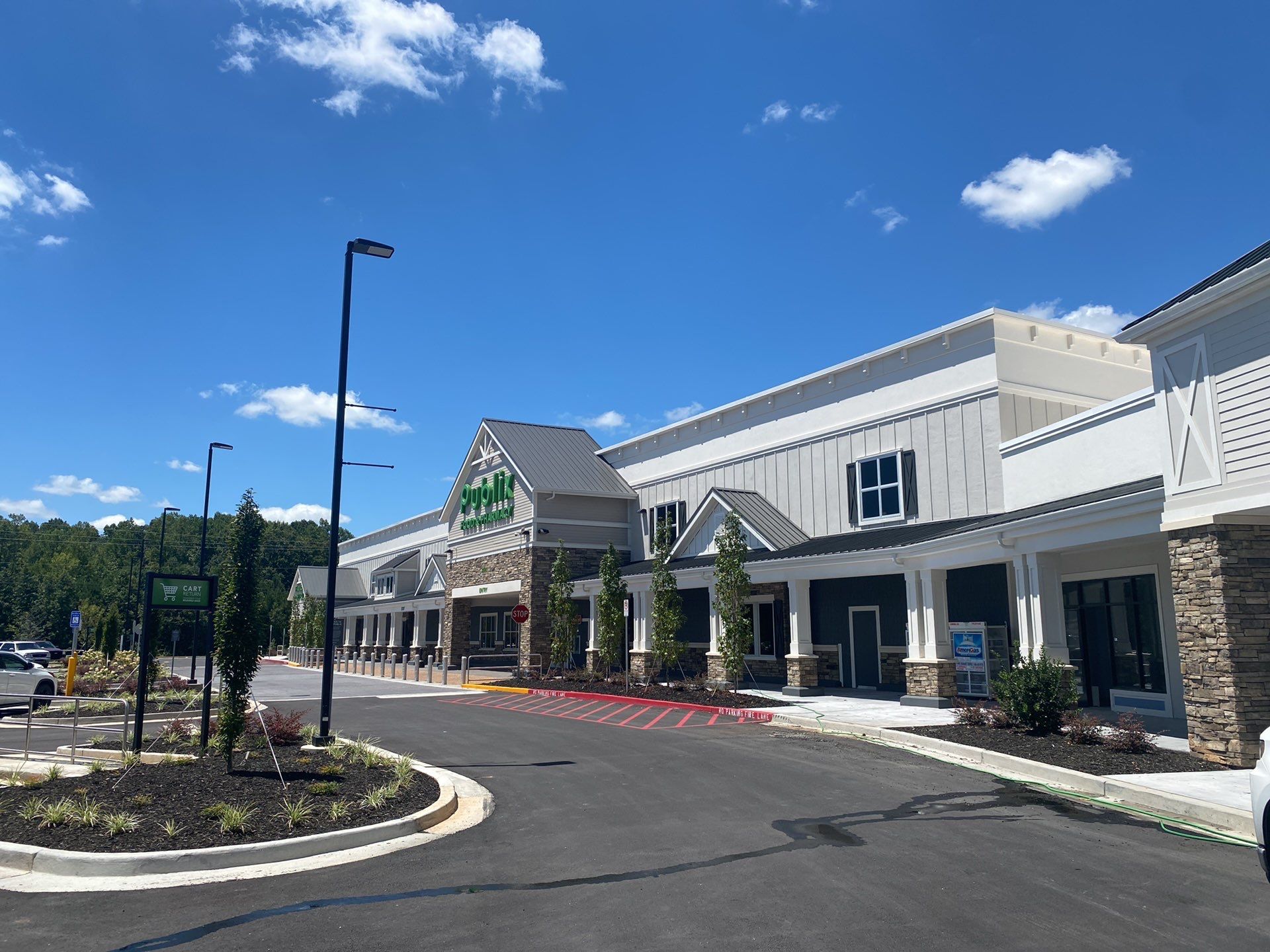 Commercial Roofing Installation using Berridge 11 1/2" Cee Lock .032 Aluminum Charcoal Grey by Infinity Metal Systems