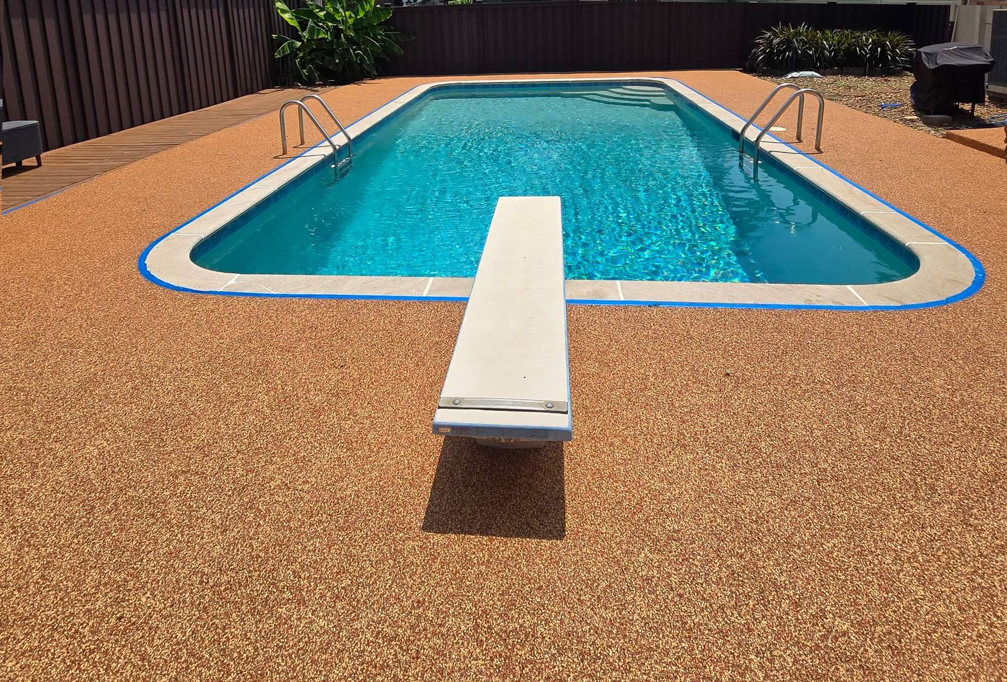 Pool Deck in warm Santa Fe by Elite Floor Solutions