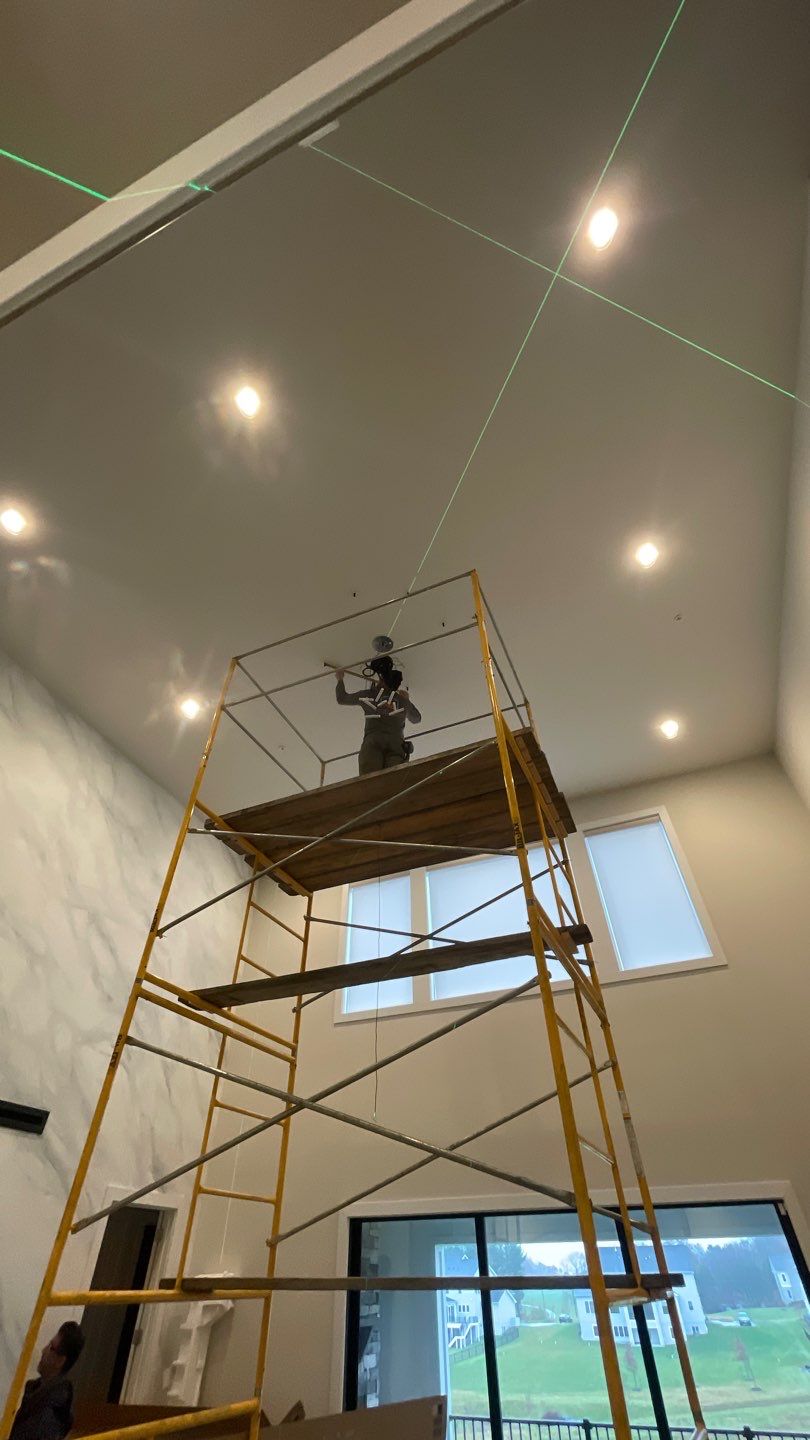 Chandelier Install  by HomeWerkes Design & Build