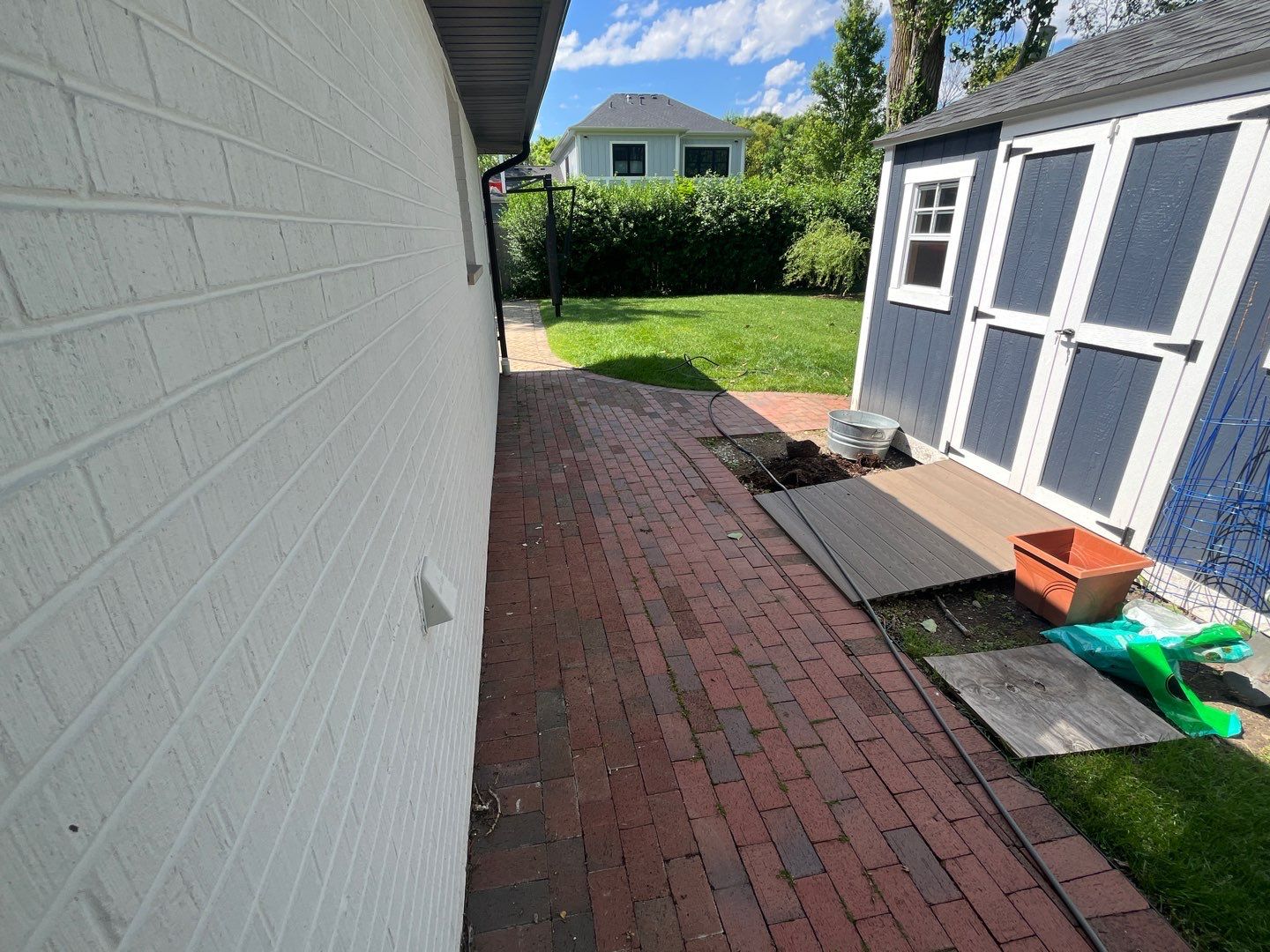 Brick paver repair, cleaning and sealing by Northern Power Washing LLC.