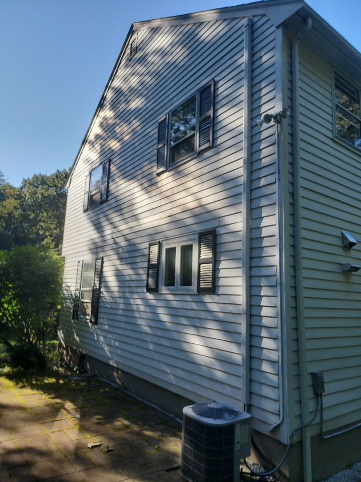 Custom window trim work and siding replacement in Dover, MA by UBrothers Construction
