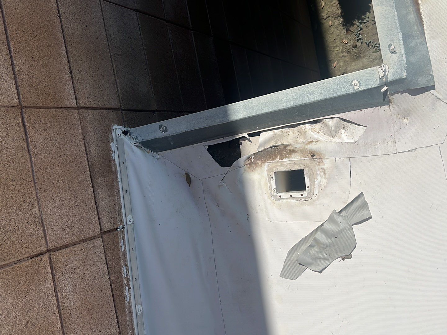 MR Roofing system using Benchmark/PUMA XL coatings over TPO single-ply roofing by Straight Edge Roofing Inc