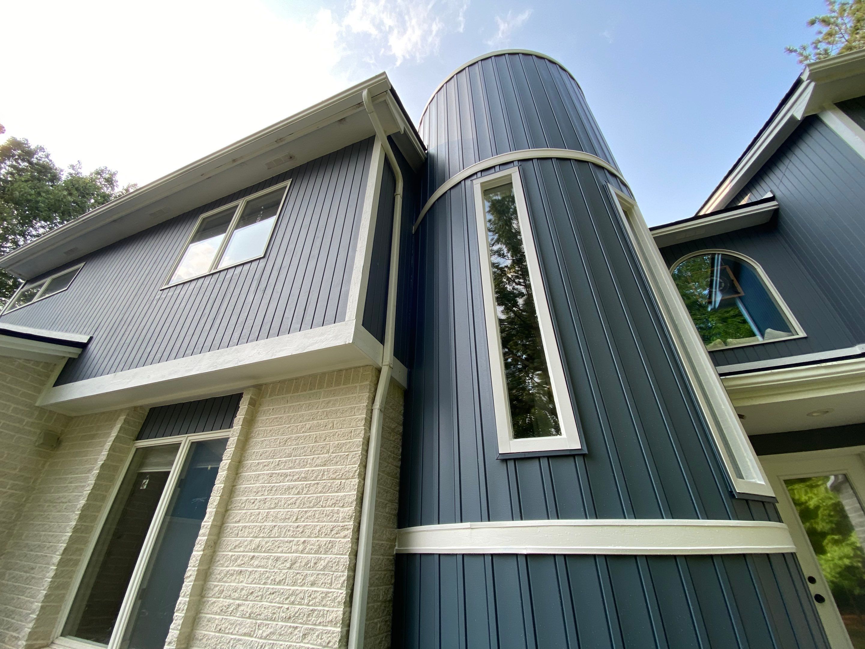 Siding Replacement using CertainTeed Board & Batten Pacific Blue by 180 Contractors