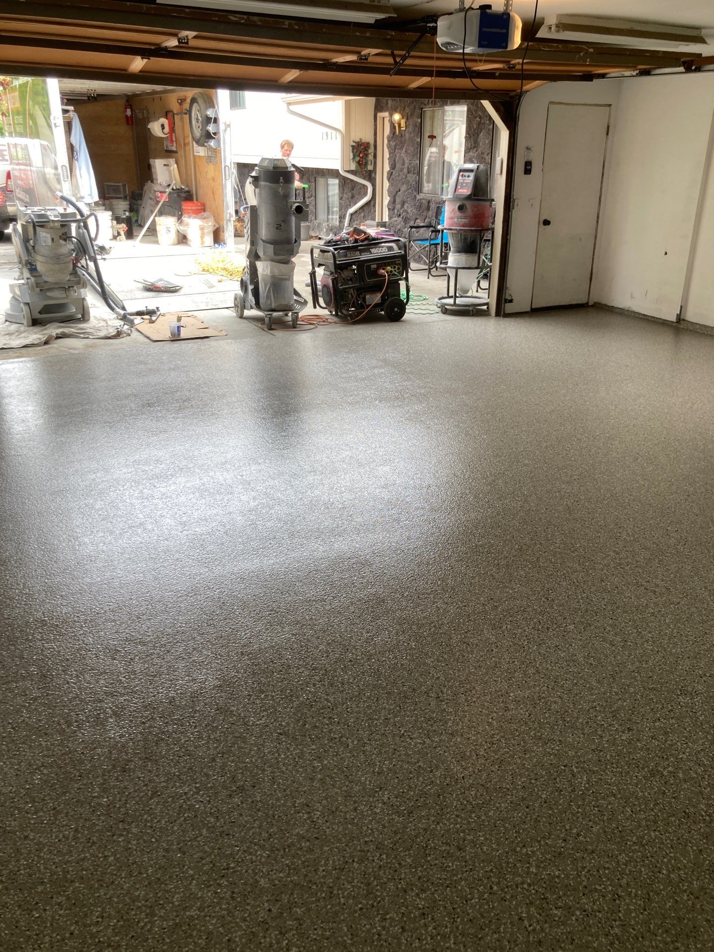 Garage Transformation using Pebble Beach by Croc Coatings, LLC