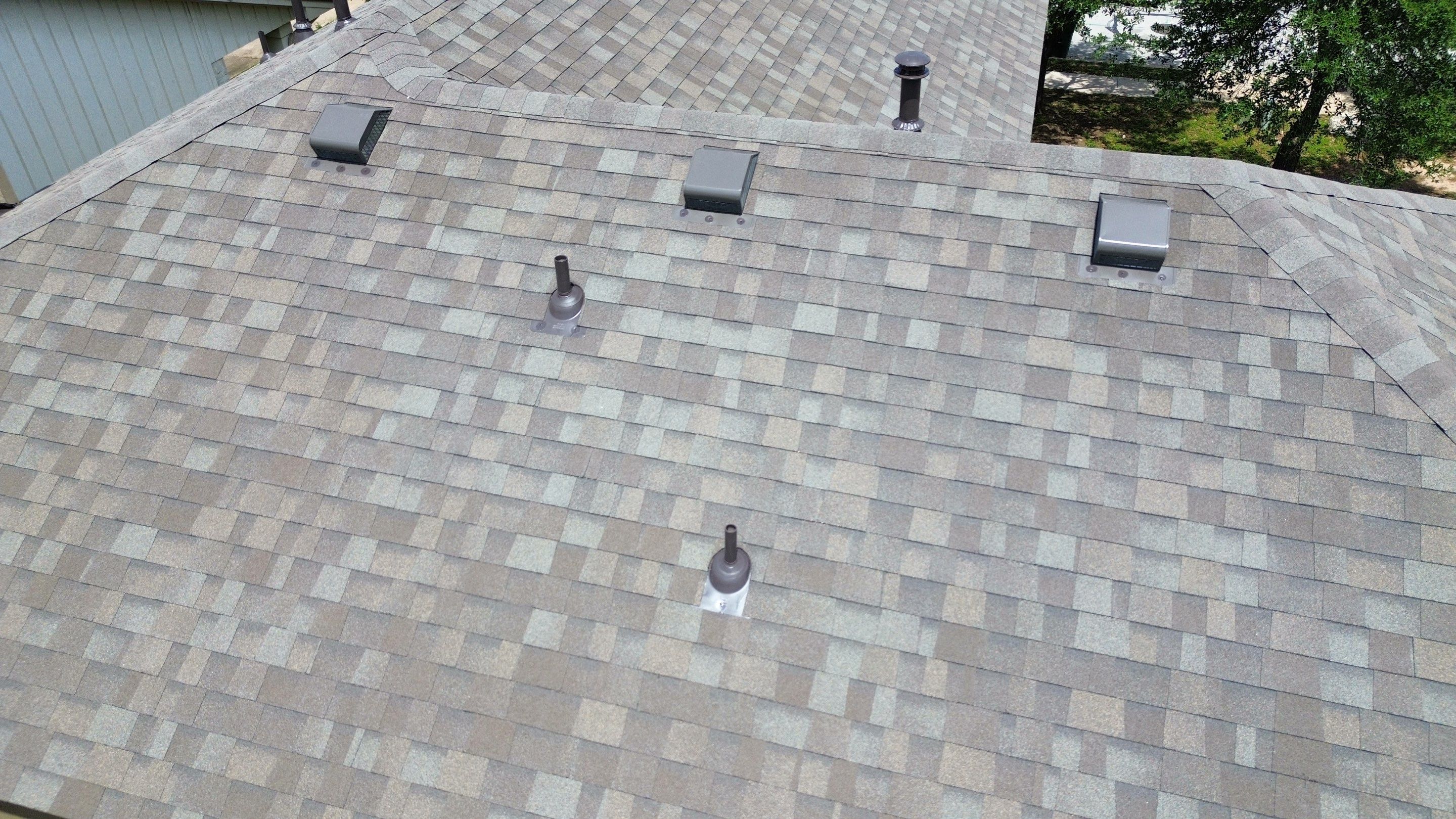 Roof Replacement & Chimney Cricket Upgrade in Cedar Park, TX by Kstylez Roofing & Construction