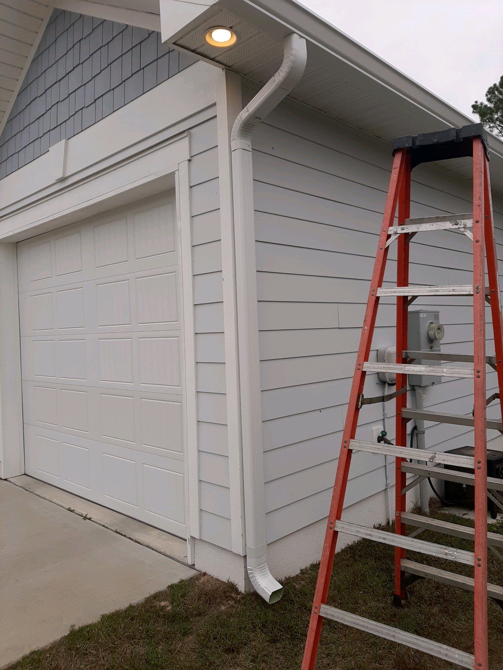 Gutter Installation using White K-Style Seamless Gutters by Gutter Professors