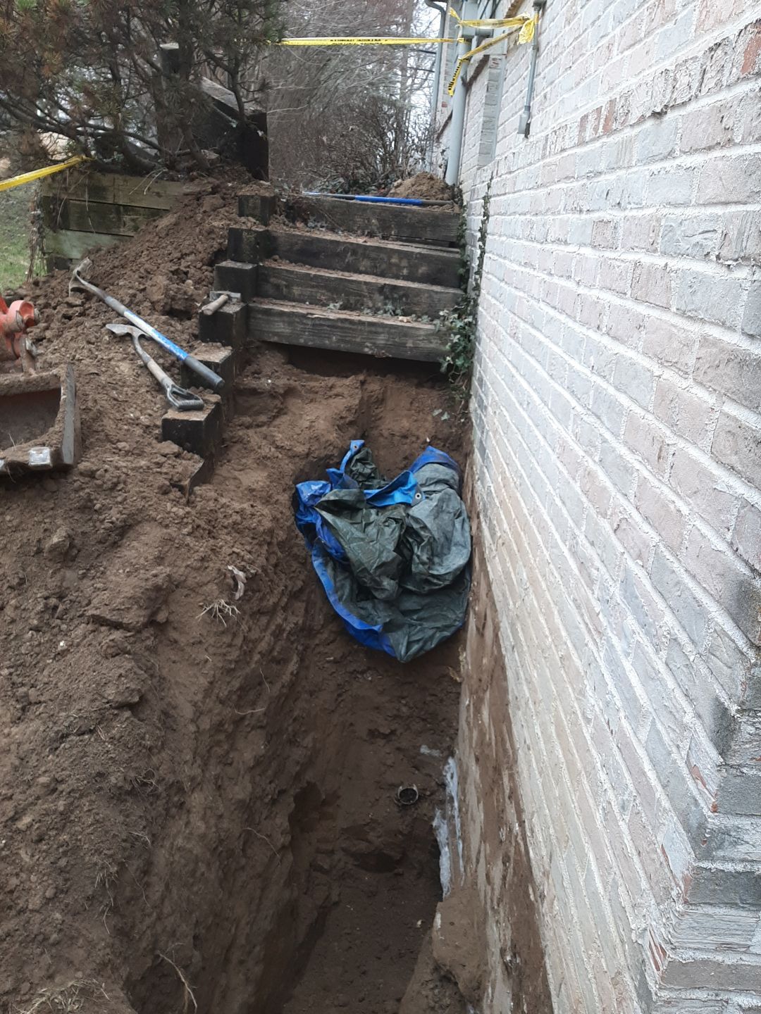 Helical Piers and Wall Crack Injections by Toledo Basement Repair